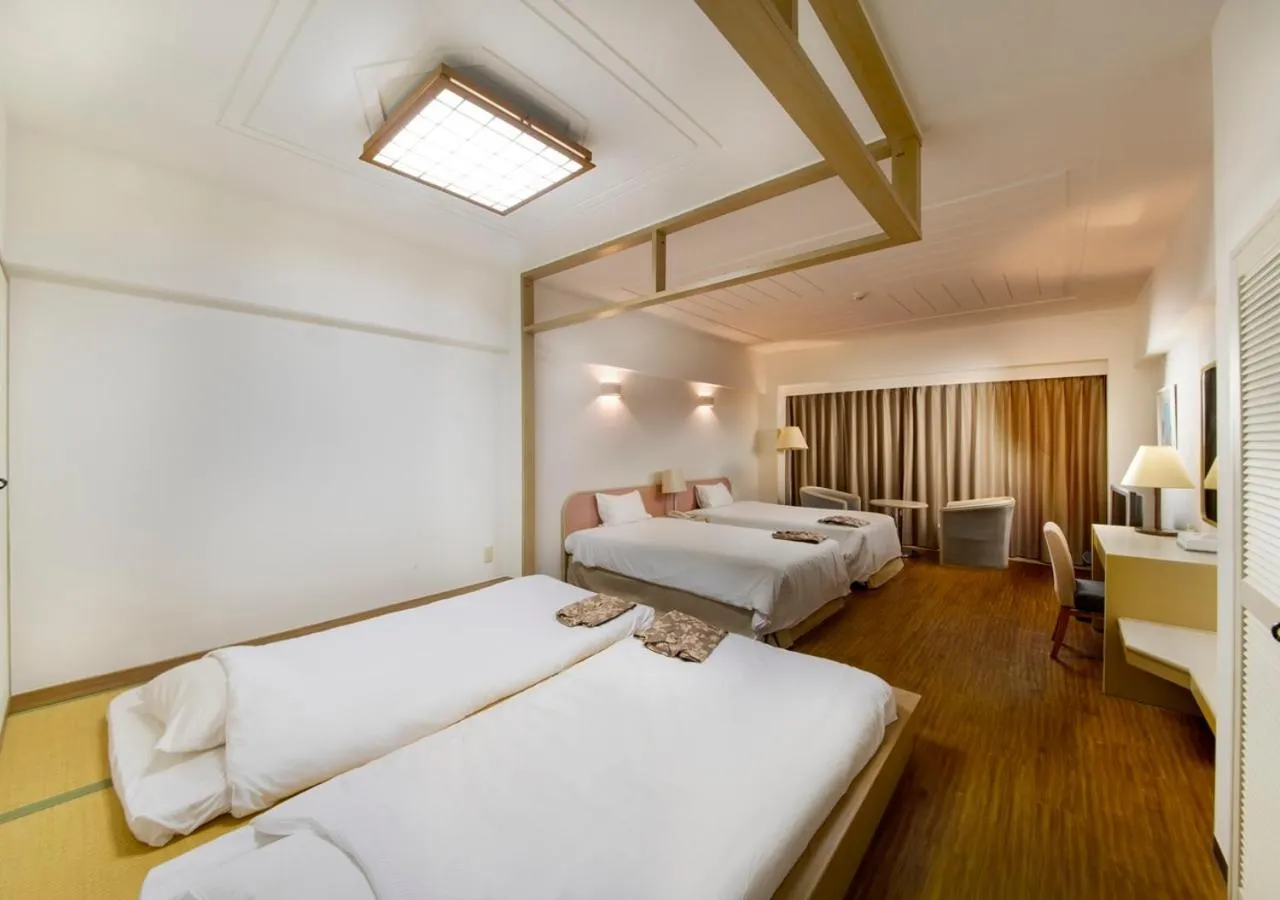 Photo of the whole room, Bed in Hotel Mahaina Wellness Resorts Okinawa