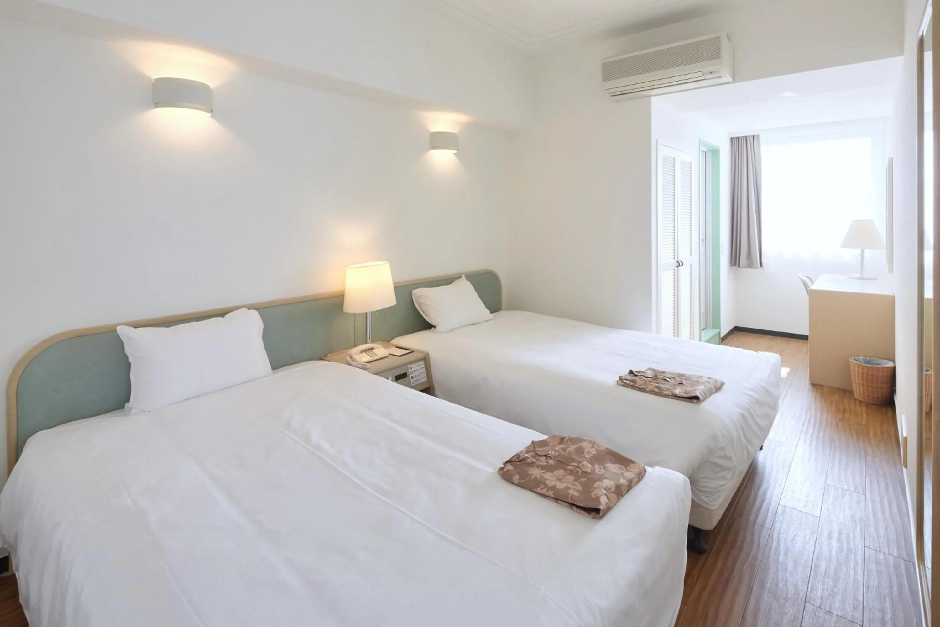 Bedroom, Bed in Hotel Mahaina Wellness Resorts Okinawa