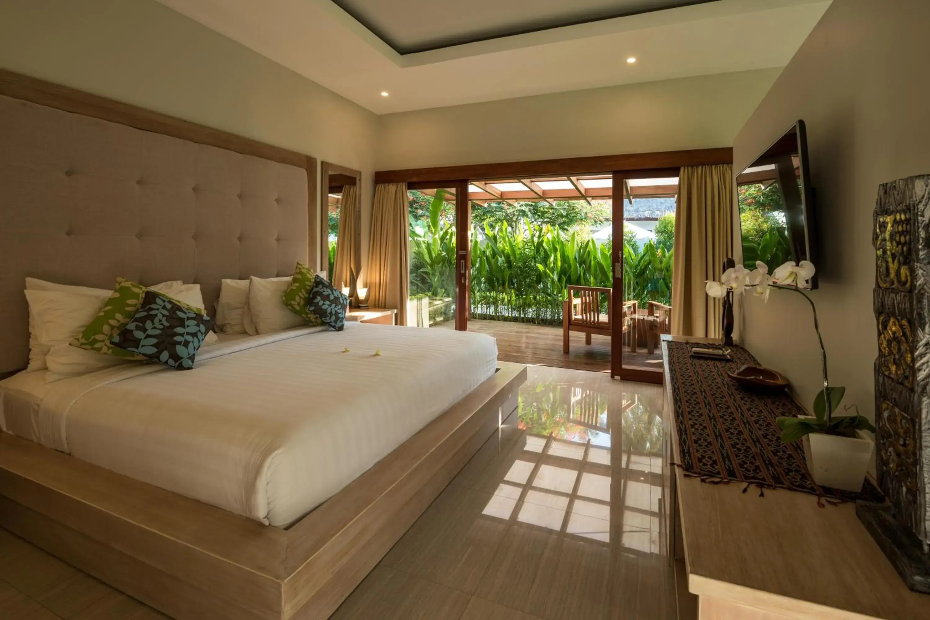 Bed in Living Asia Resort and Spa