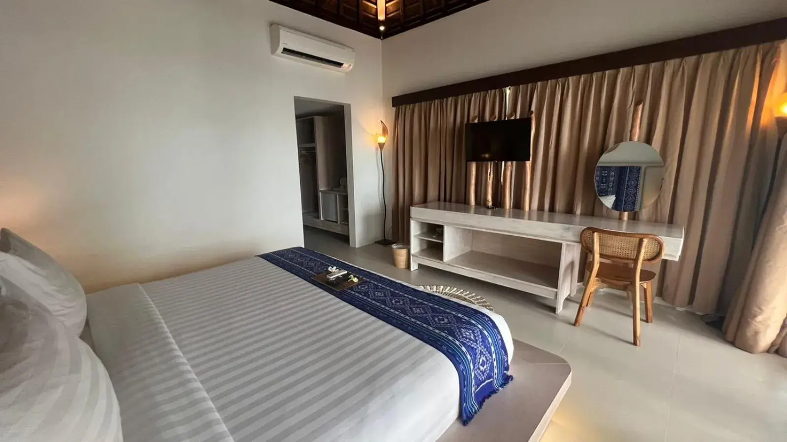 Bed in Living Asia Resort and Spa