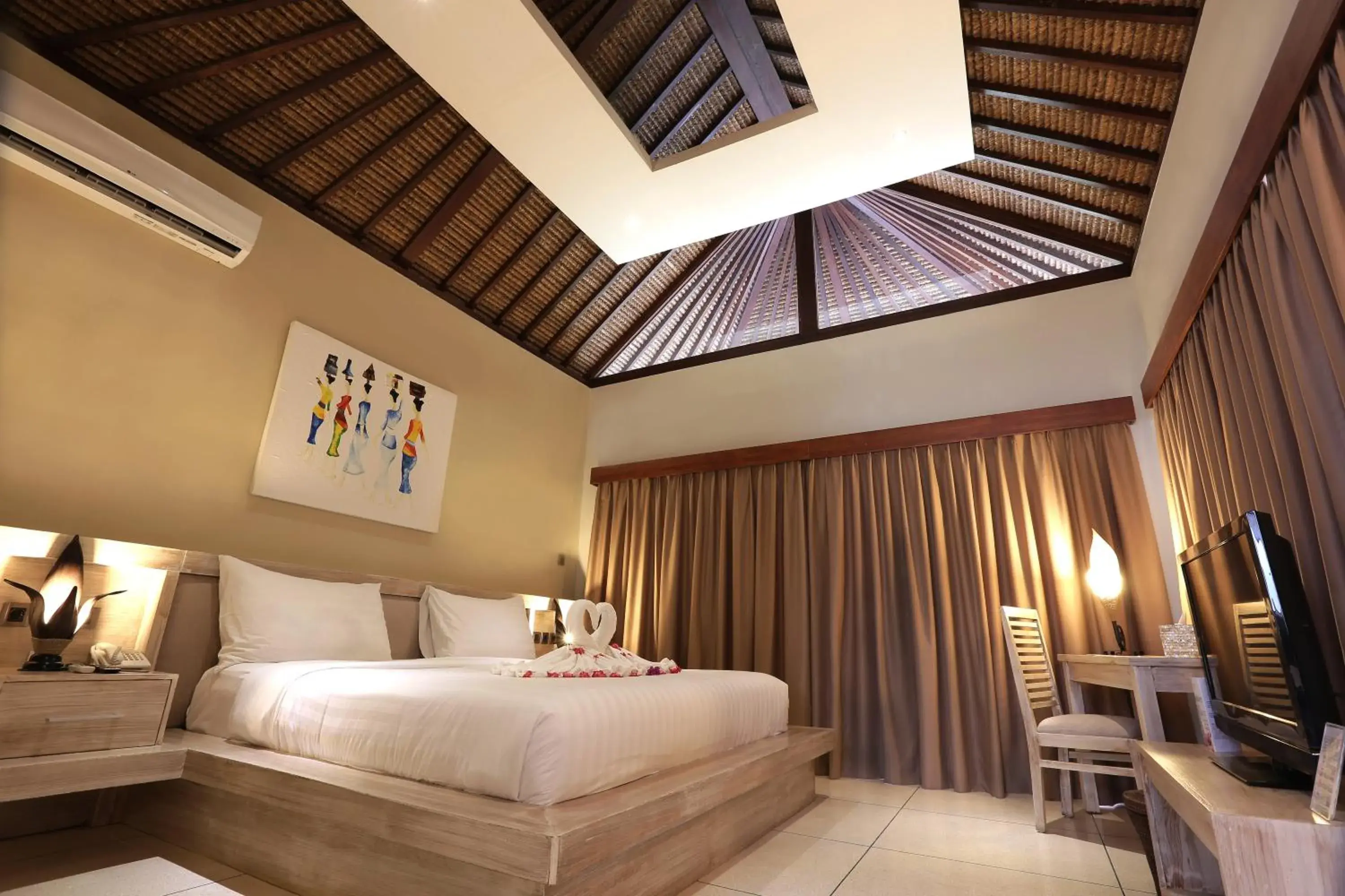 Photo of the whole room, Bed in Living Asia Resort and Spa