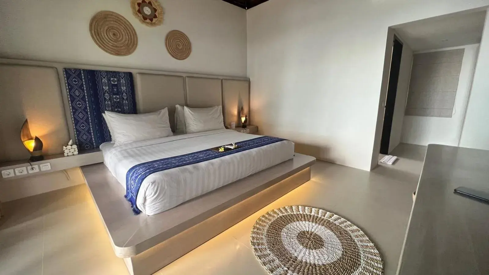 Bed in Living Asia Resort and Spa