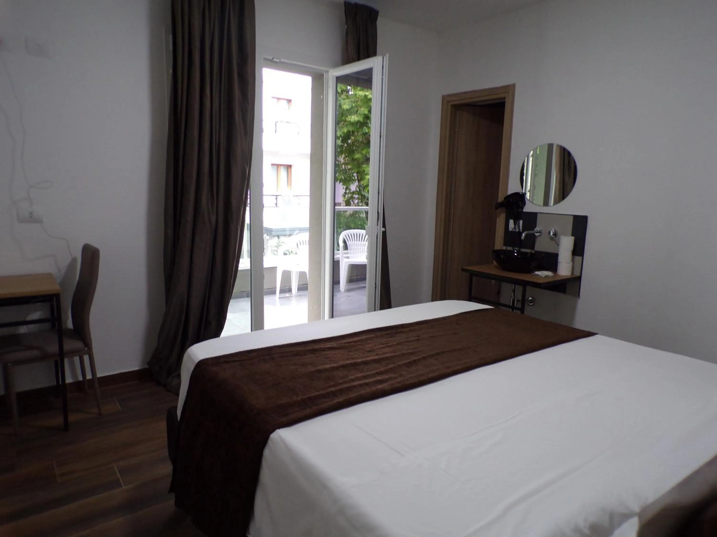 Bedroom in Hotel Nord Est