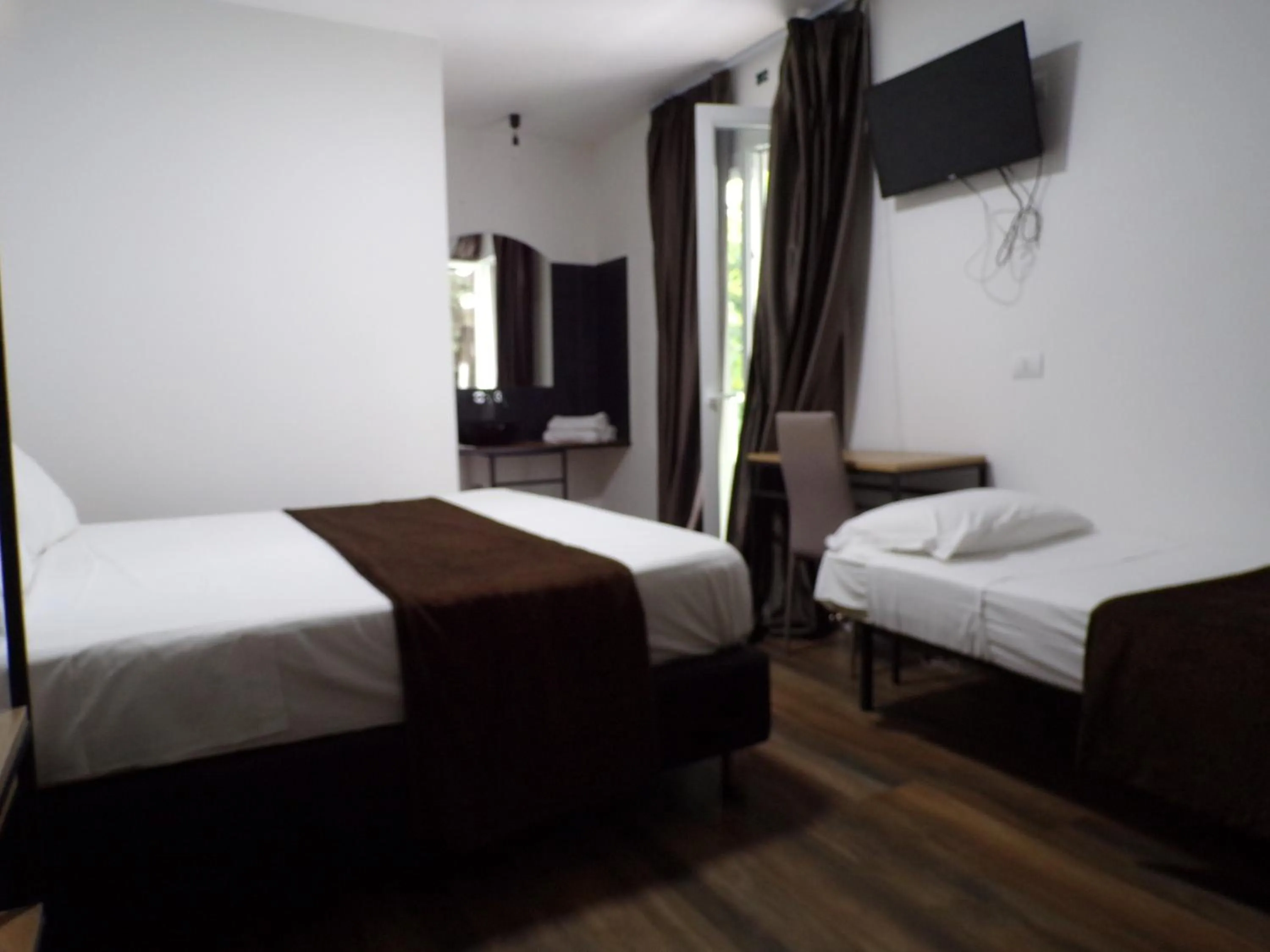 Bedroom in Hotel Nord Est