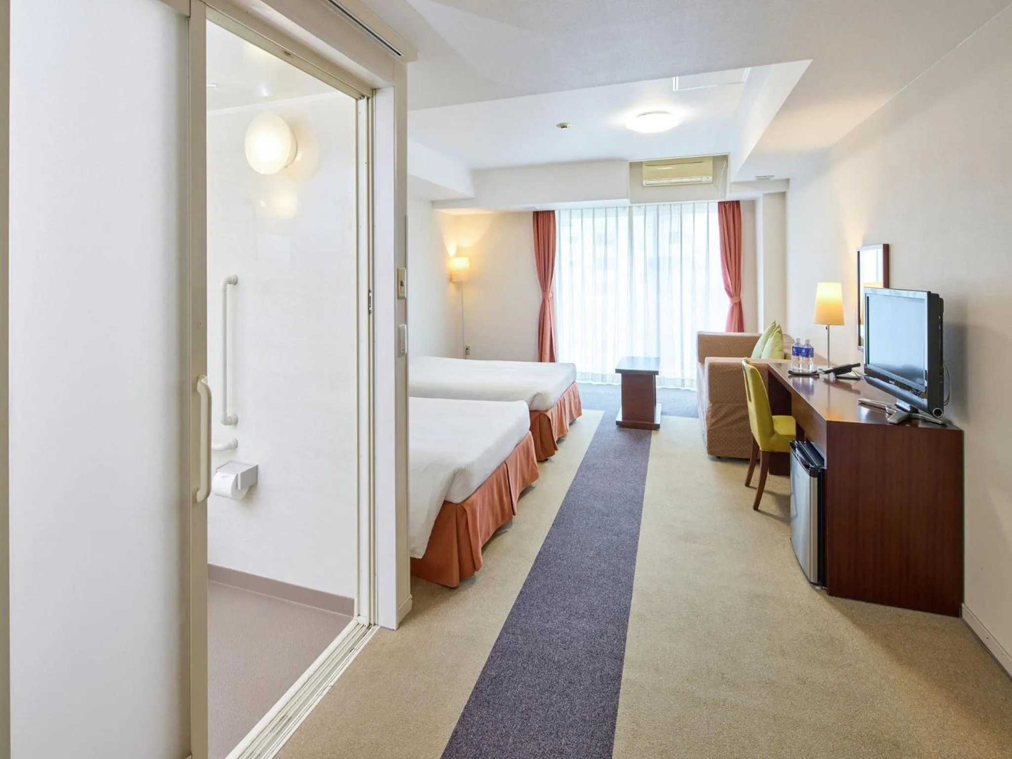 Bed in Hotel Yugaf Inn Okinawa