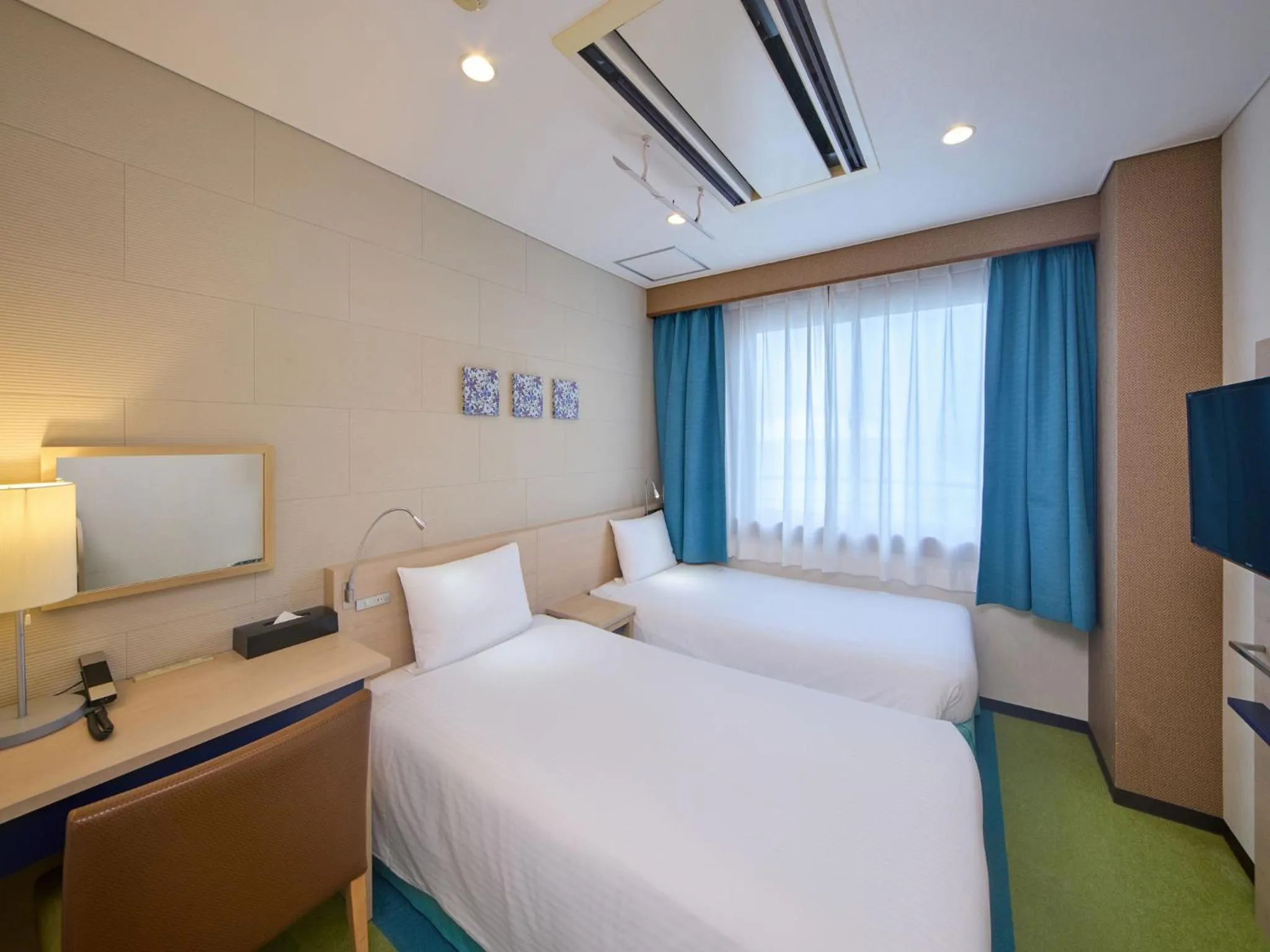 Bed in Hotel Yugaf Inn Okinawa