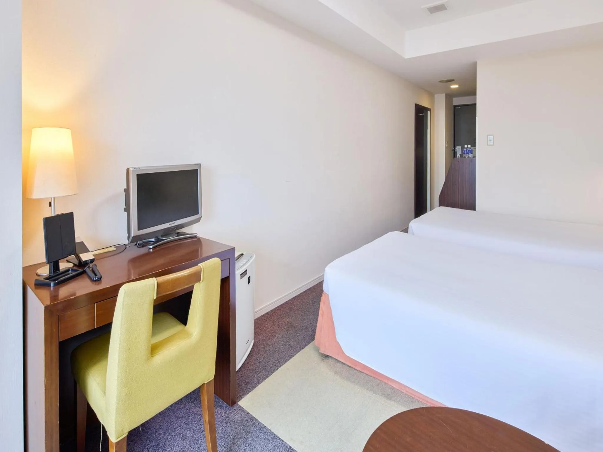 Bed in Hotel Yugaf Inn Okinawa