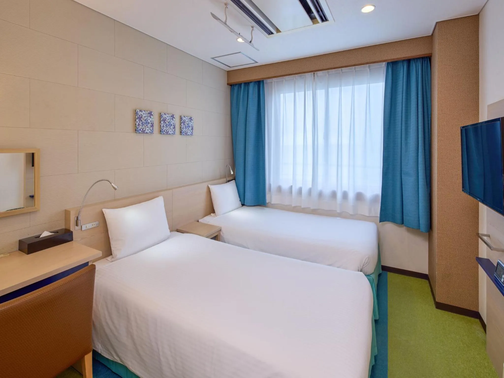 Bed in Hotel Yugaf Inn Okinawa