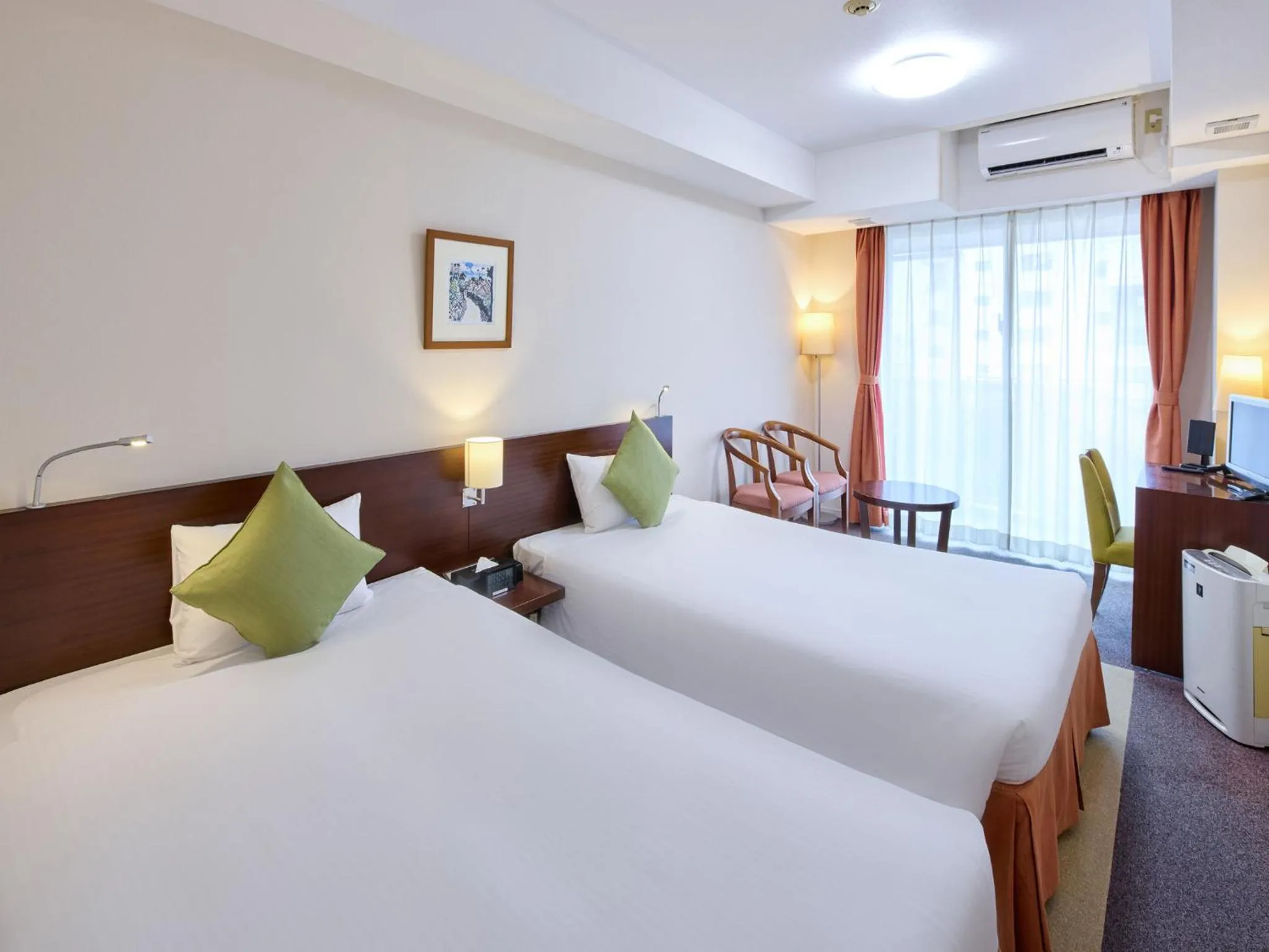 Bed in Hotel Yugaf Inn Okinawa