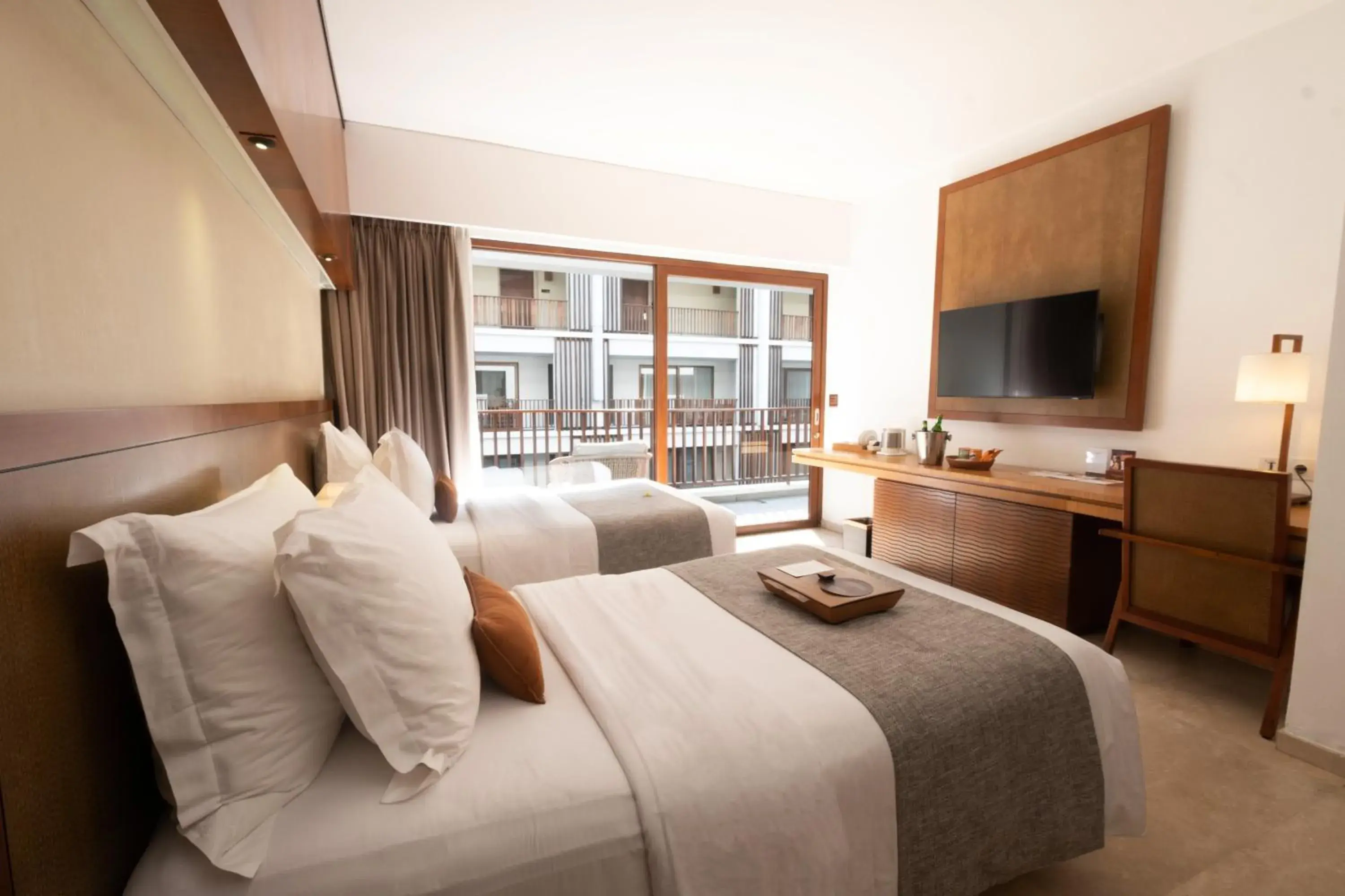 Deluxe Room Pool View Twin Bed in The Magani Hotel and Spa Deluxe Room Pool View Twin Bed in The Magani Hotel and Spa