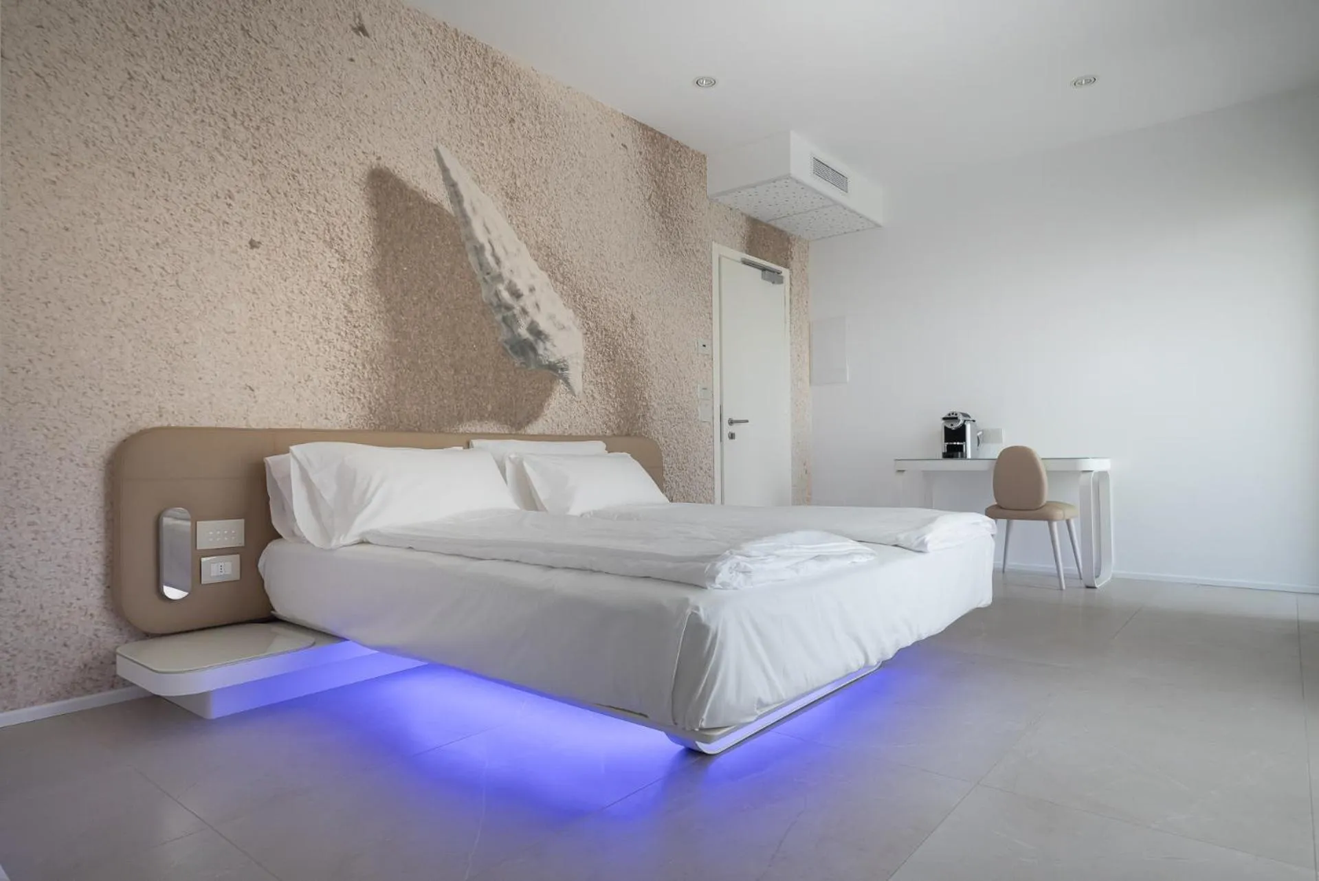 Bed in Unico Hotel Caorle