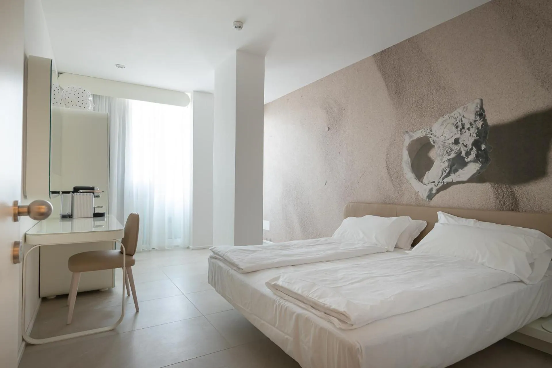 Photo of the whole room, Bed in Unico Hotel Caorle