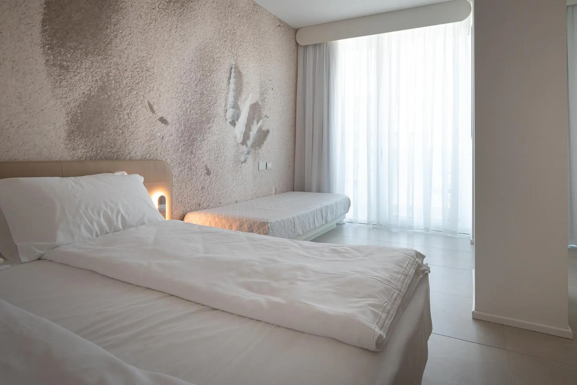 Photo of the whole room, Bed in Unico Hotel Caorle