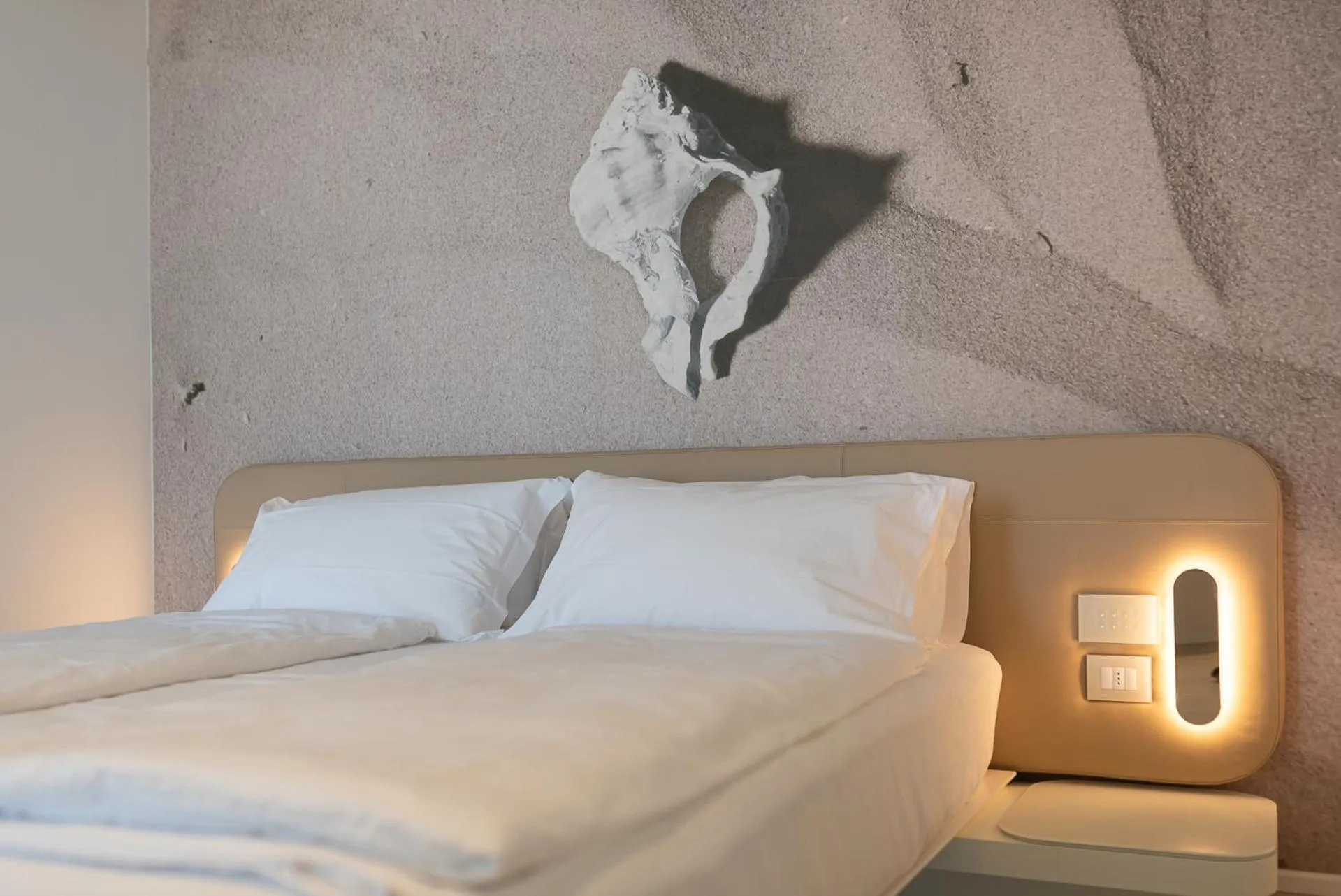Bed in Unico Hotel Caorle