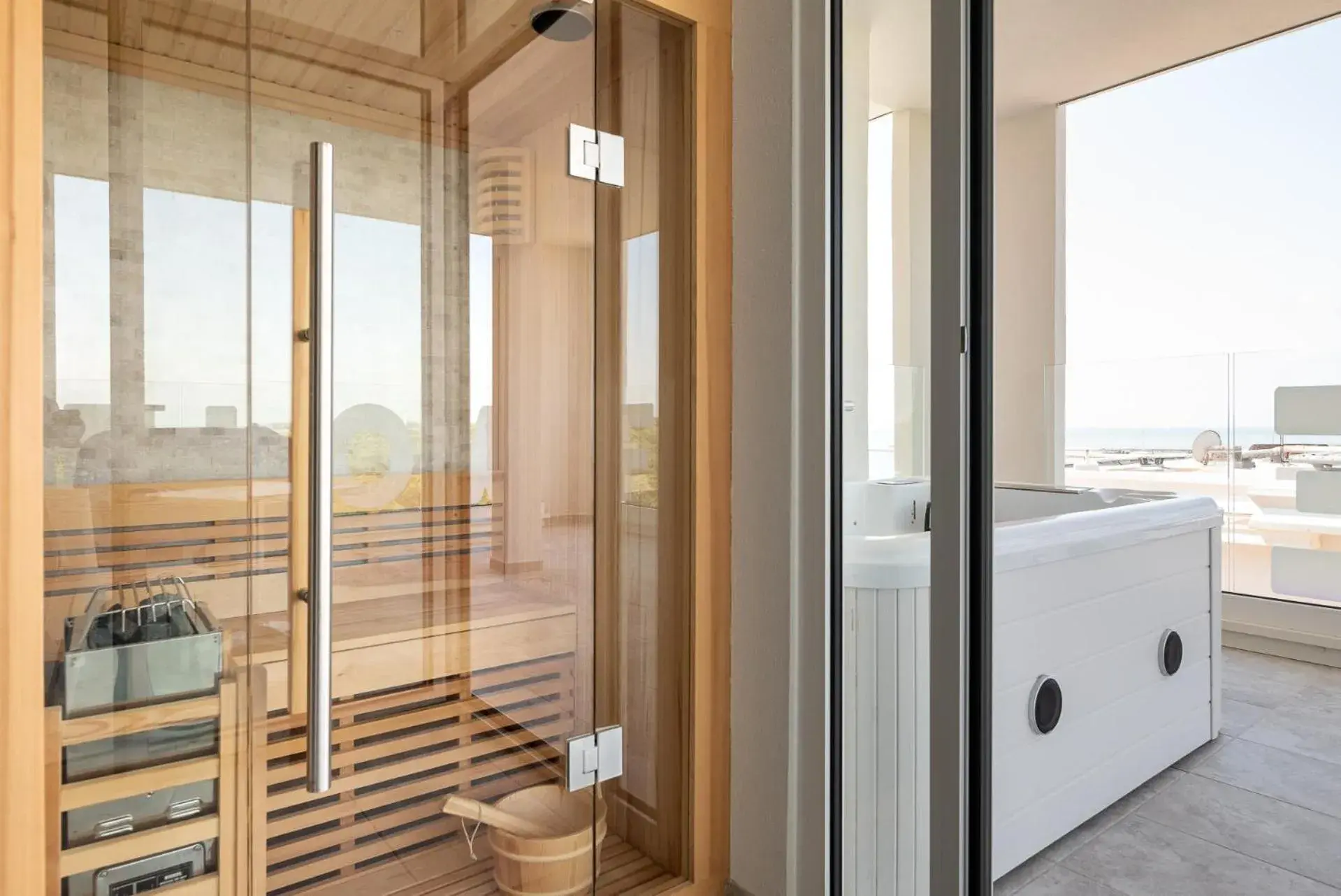 Superior Triple Room with Jacuzzi and Side Sea View in Unico Hotel Caorle Superior Triple Room with Jacuzzi and Side Sea View in Unico Hotel Caorle