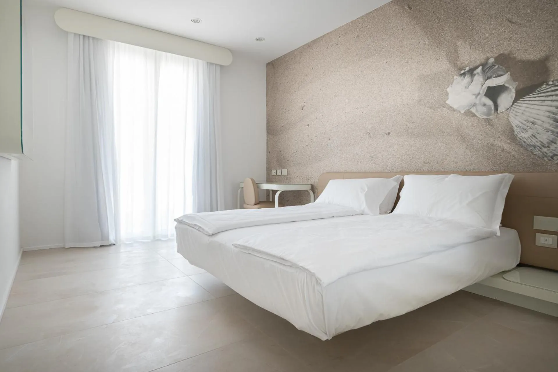 Bed in Unico Hotel Caorle