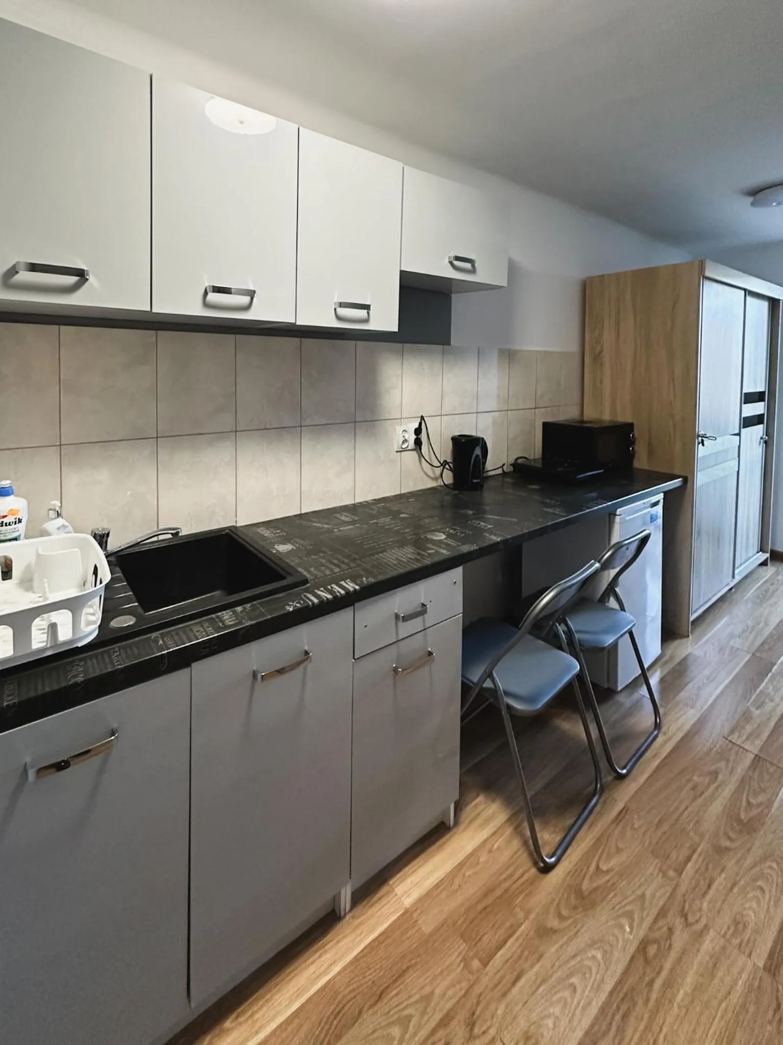 Kitchen or kitchenette in Kwadrat B&B Spiechowicza