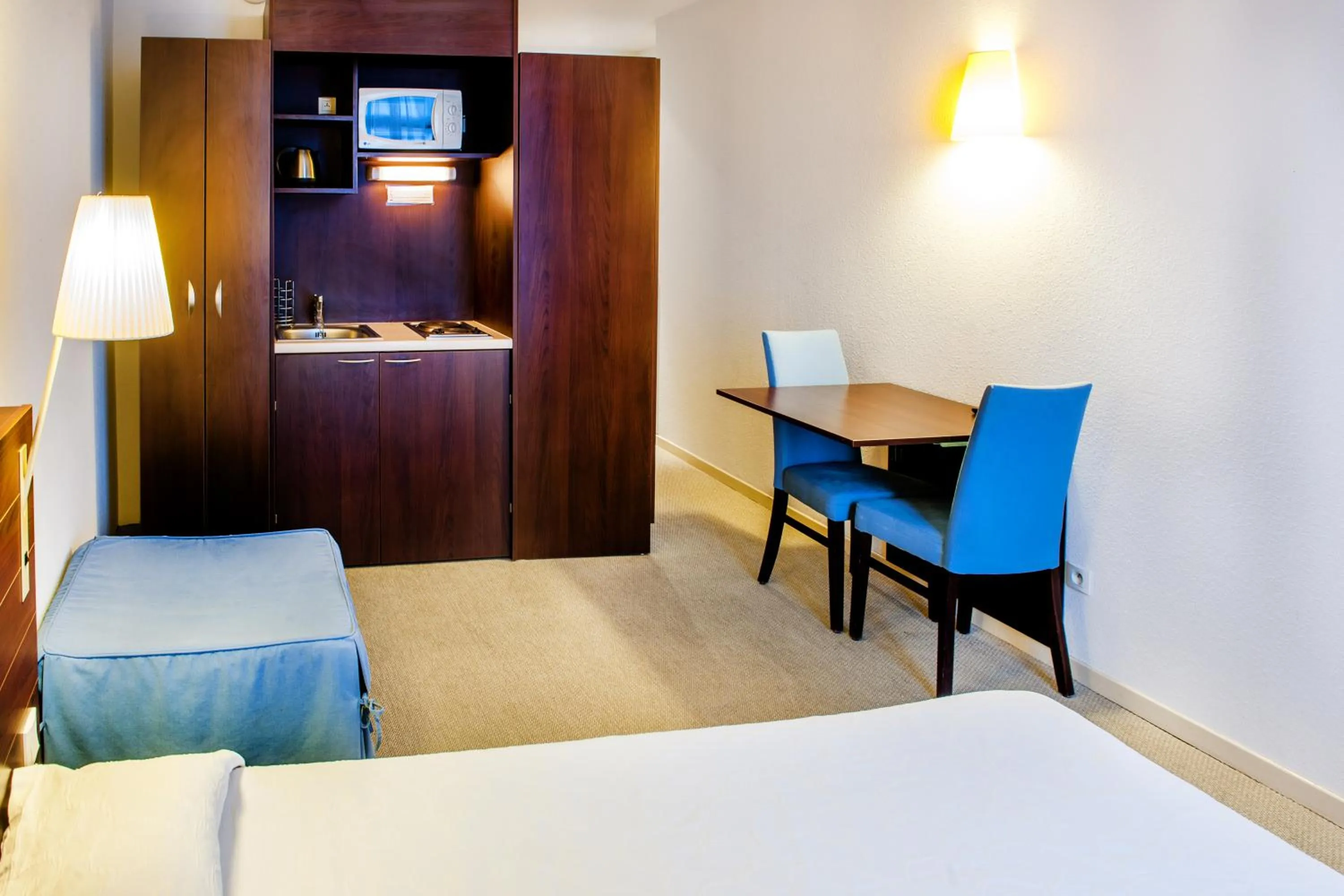 Living room, Bed in Appart'hôtel Saint Jean