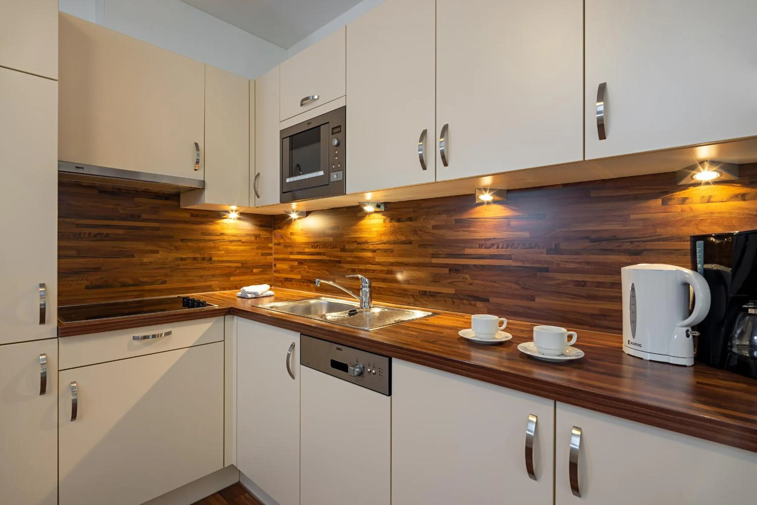 Kitchen or kitchenette in Apart-Hotel Aurora Fiss