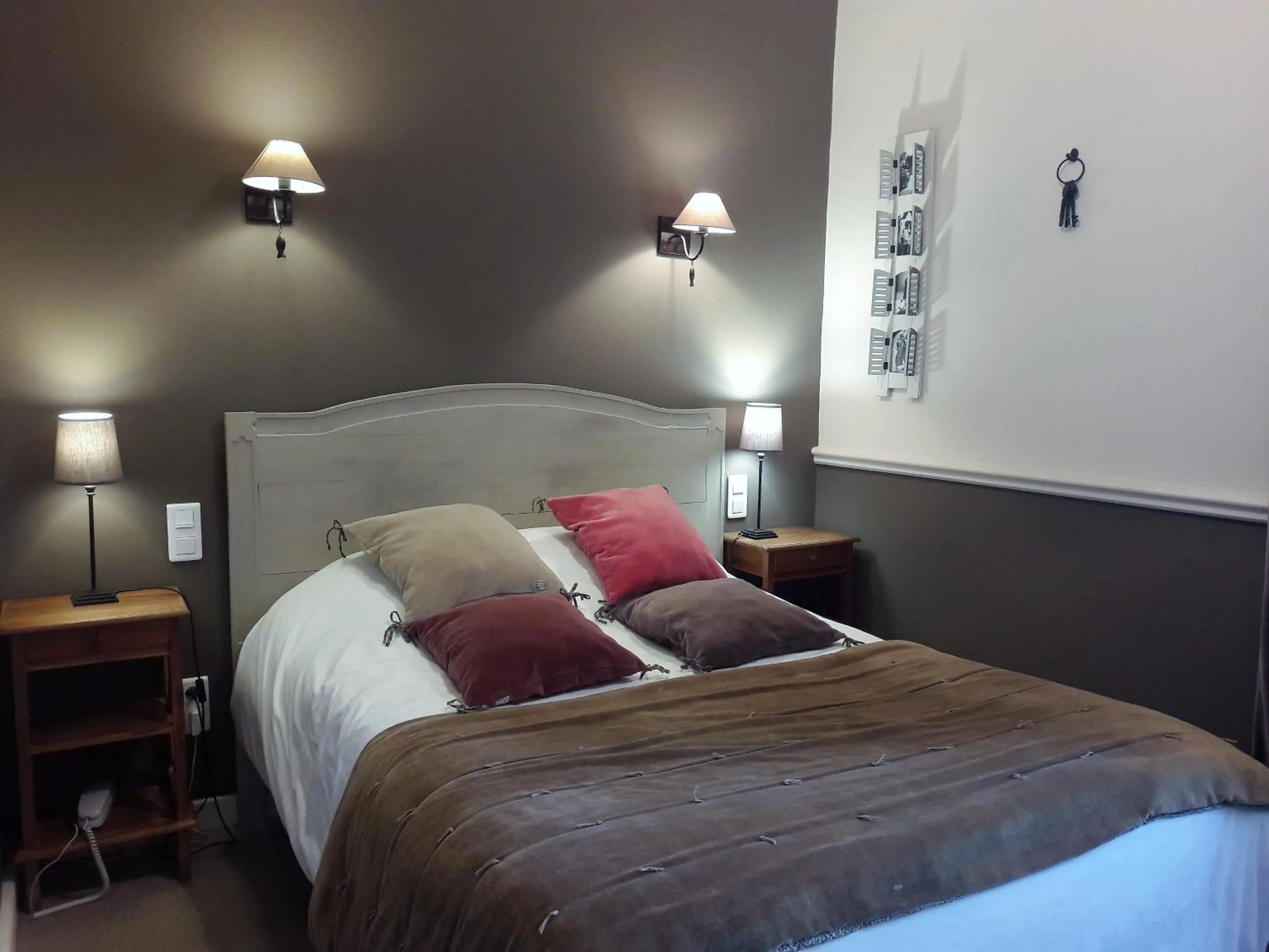 Bed in LogisHotels Le Relais du Quercy