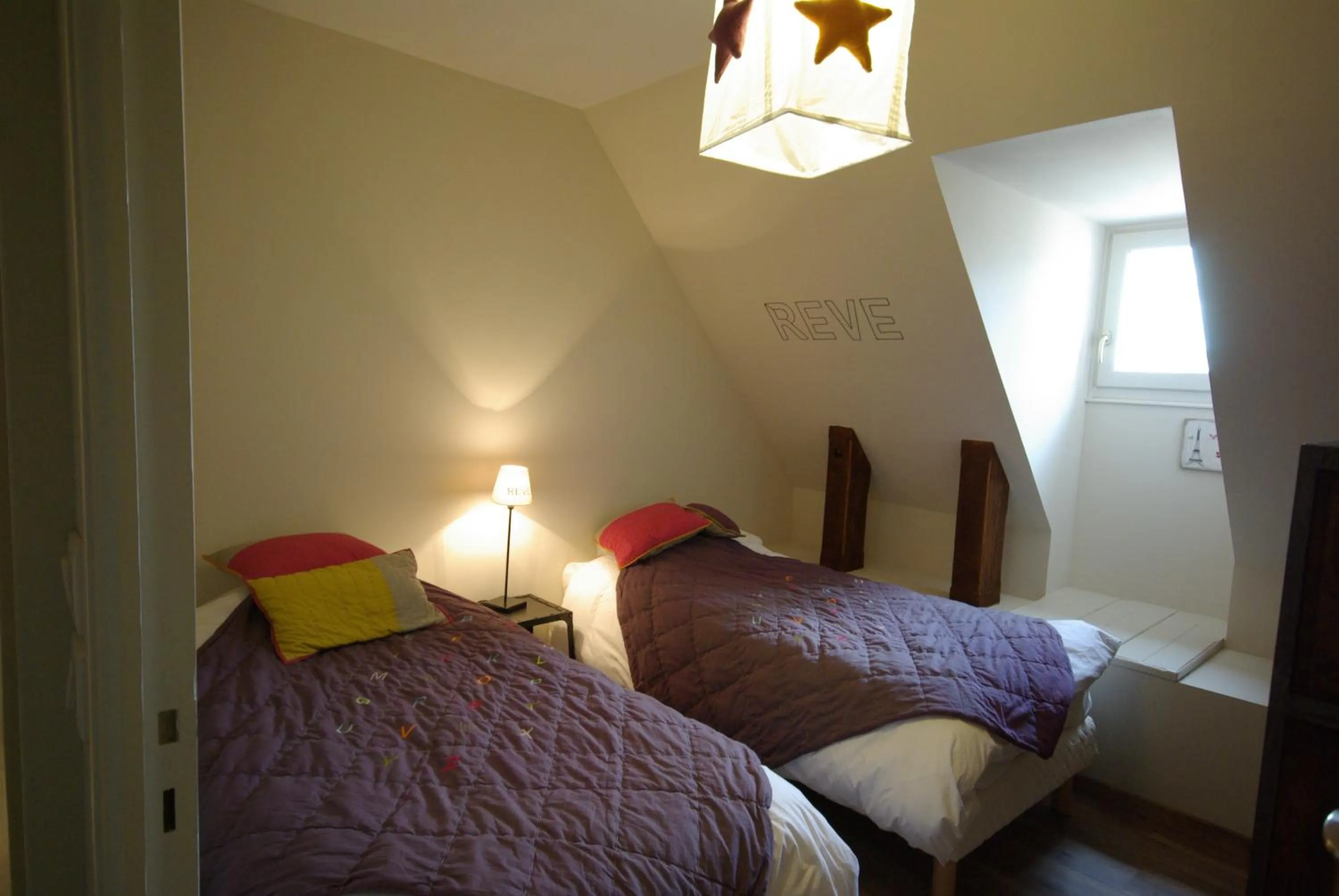 Bed in LogisHotels Le Relais du Quercy