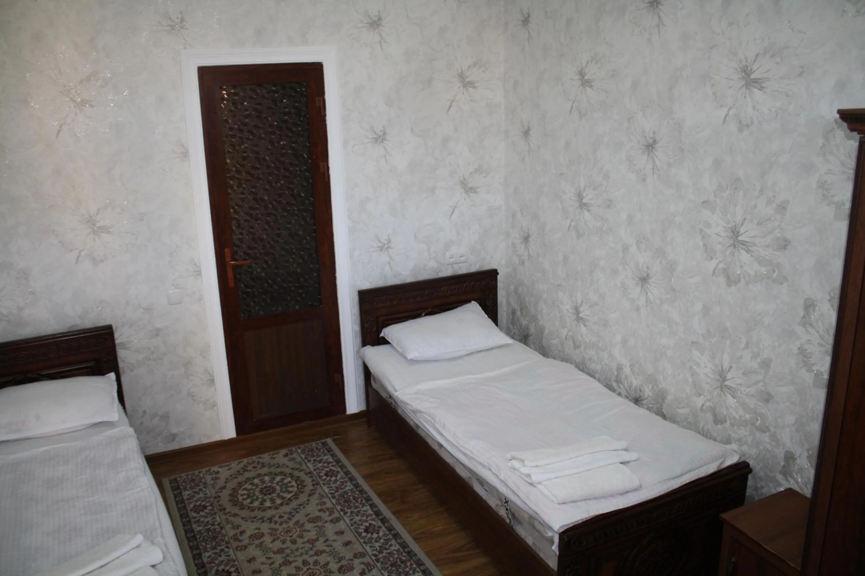 Bed in Tilyakori Hotel