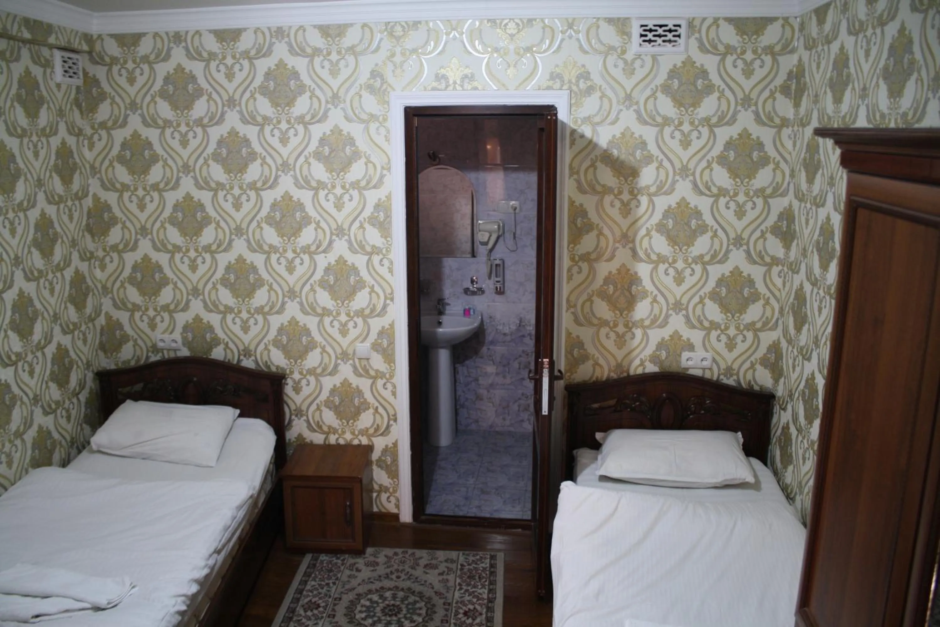 Bed in Tilyakori Hotel