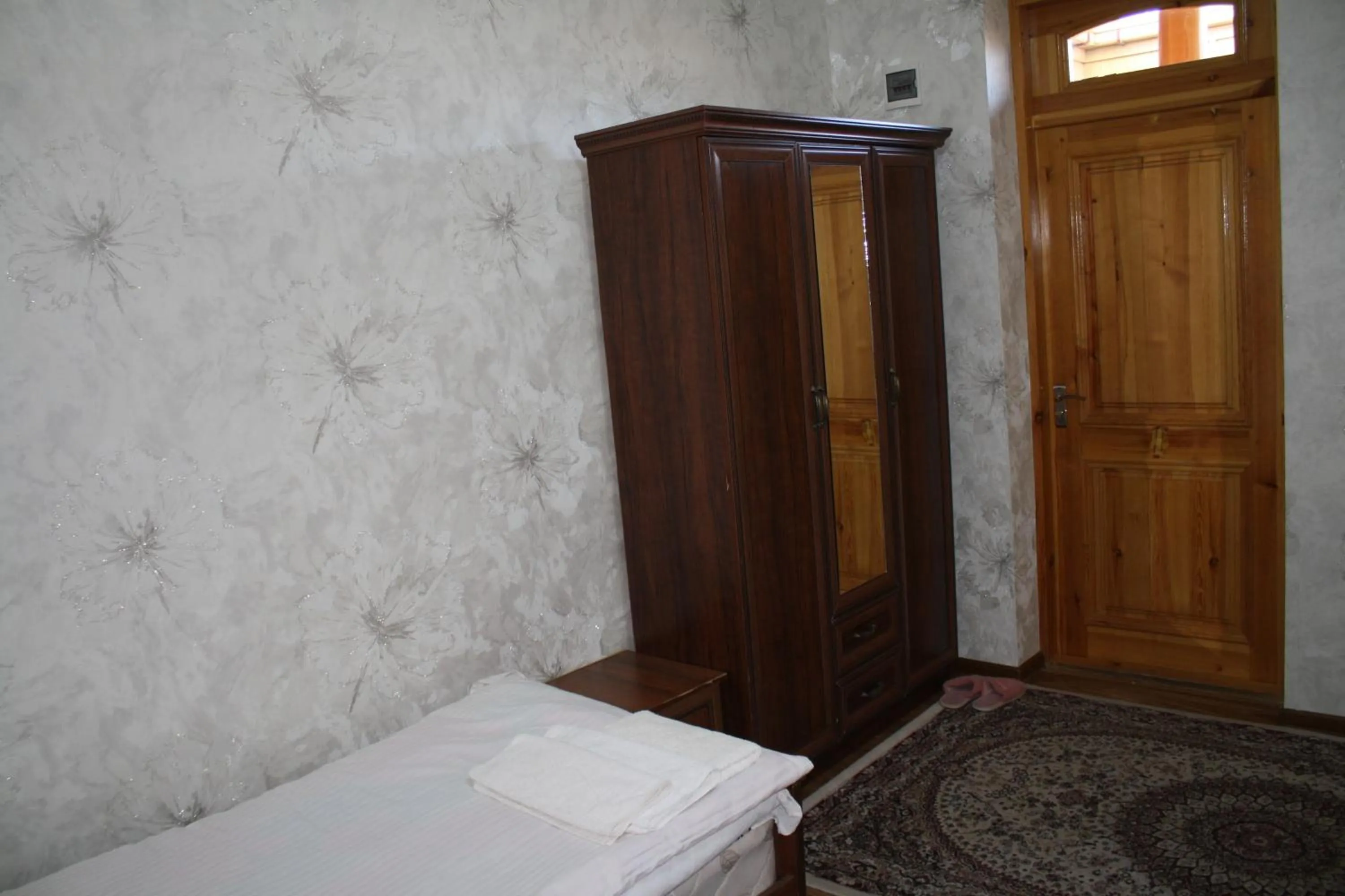 Bed in Tilyakori Hotel