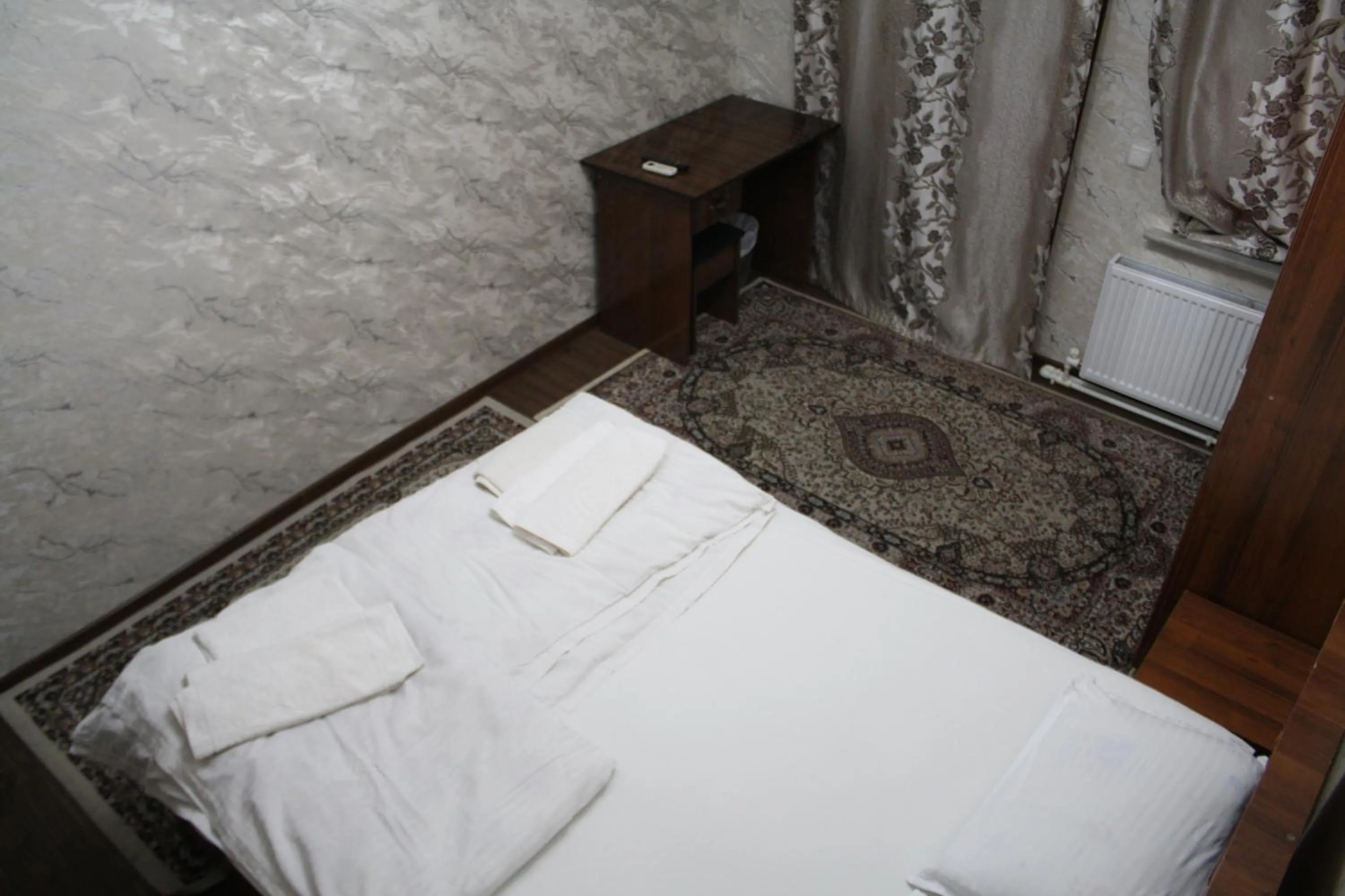 Bed in Tilyakori Hotel