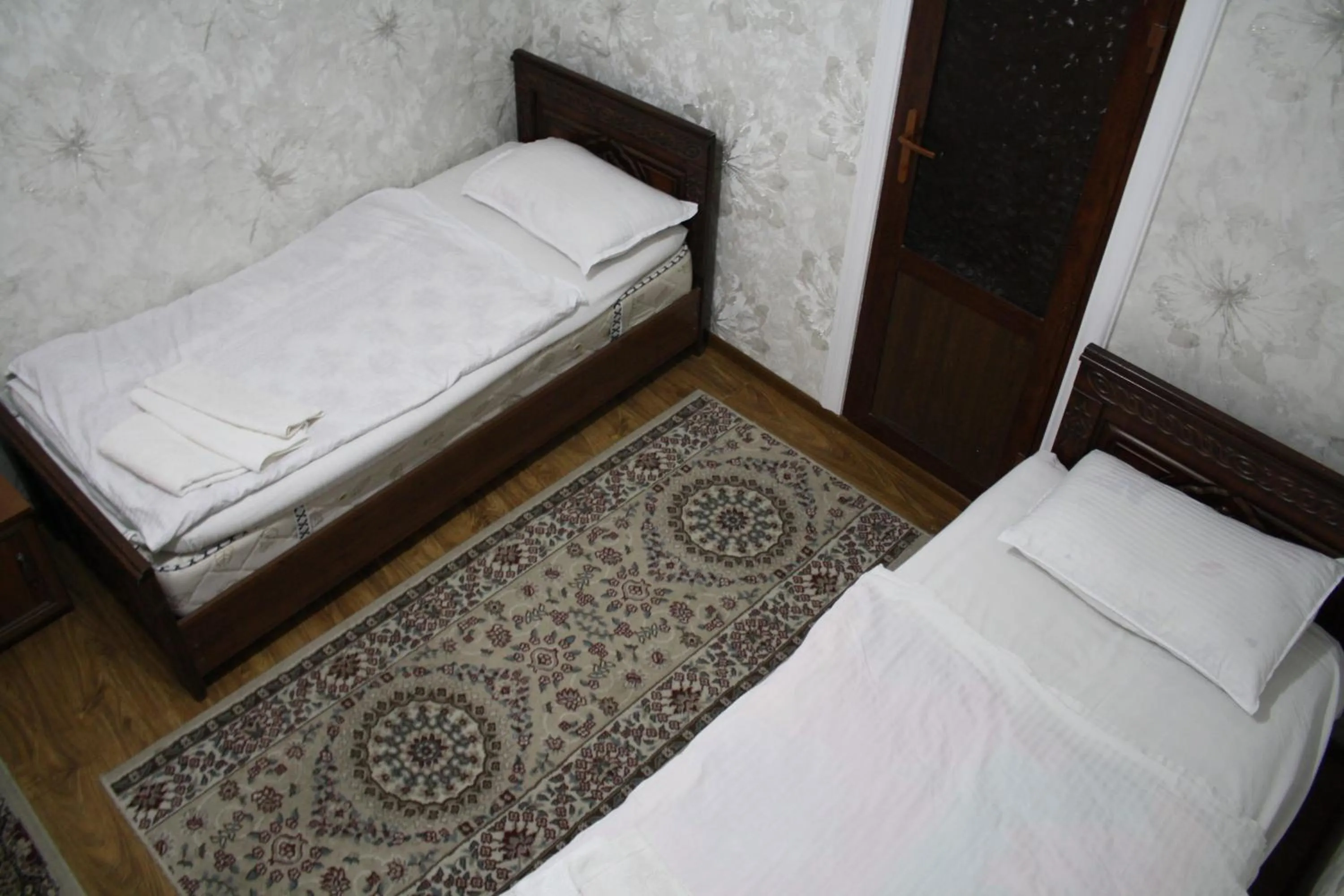 Bed in Tilyakori Hotel
