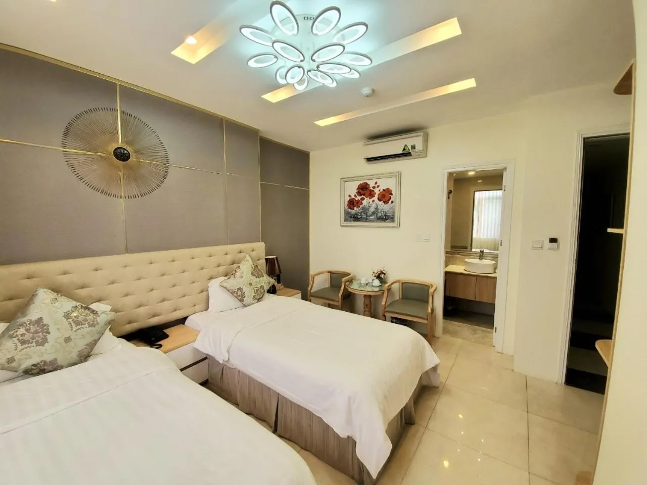 Bed in DLmos Hanoi Hotel