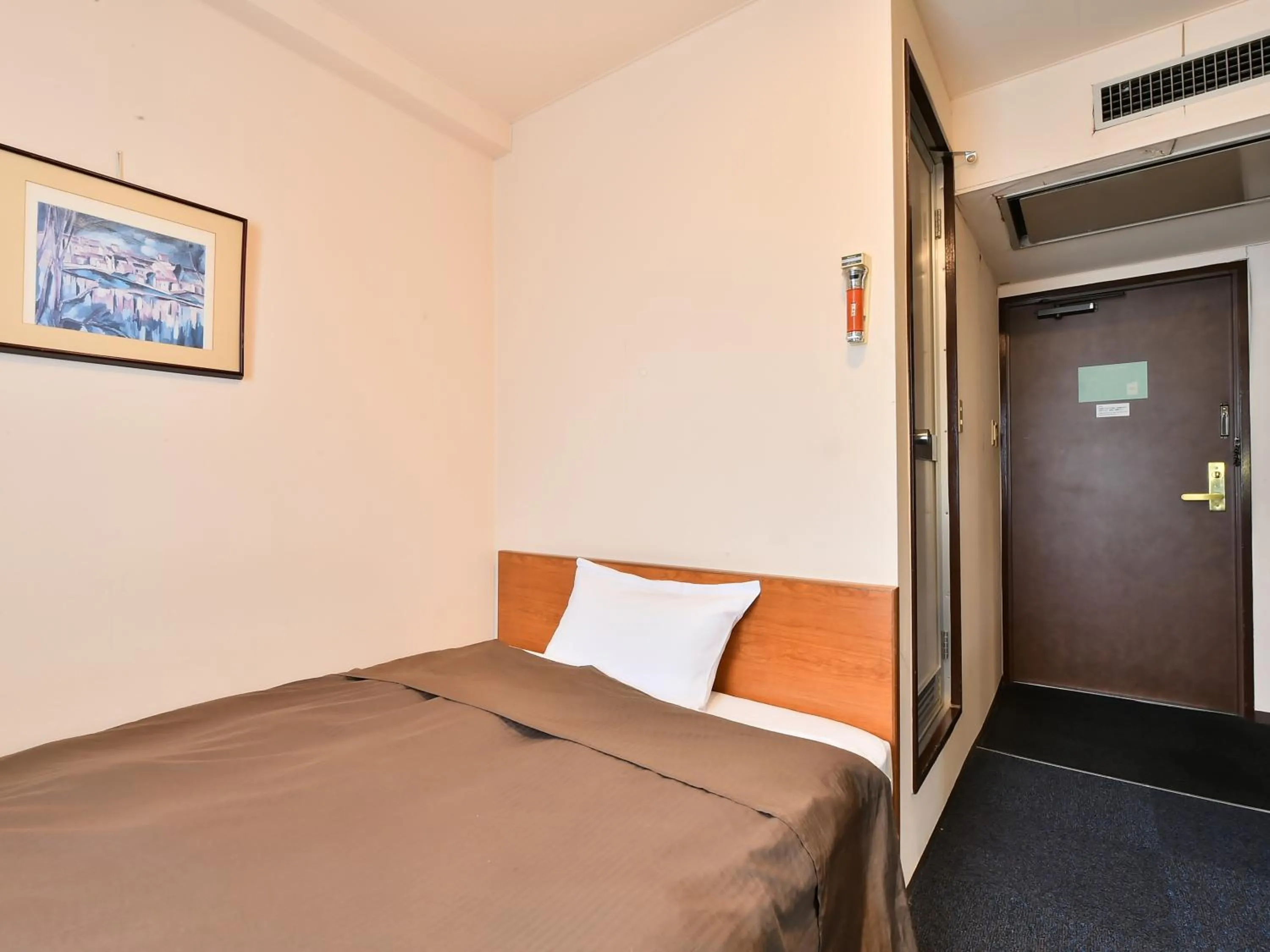 Bed in Suzuka Royal Hotel