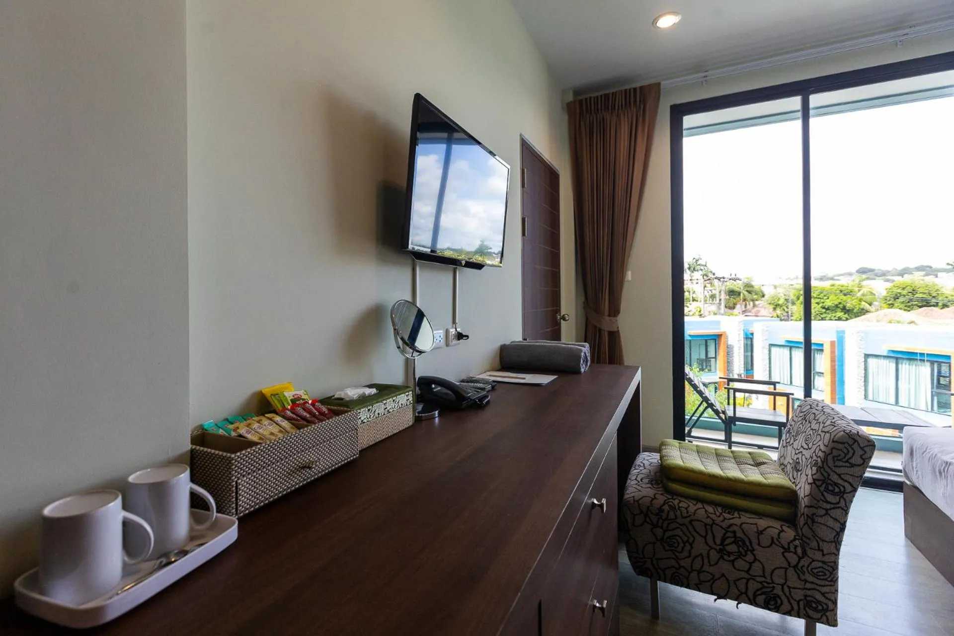 TV and multimedia in Peace Blue Naiharn Naturist Resort Phuket SHA Extra Plus