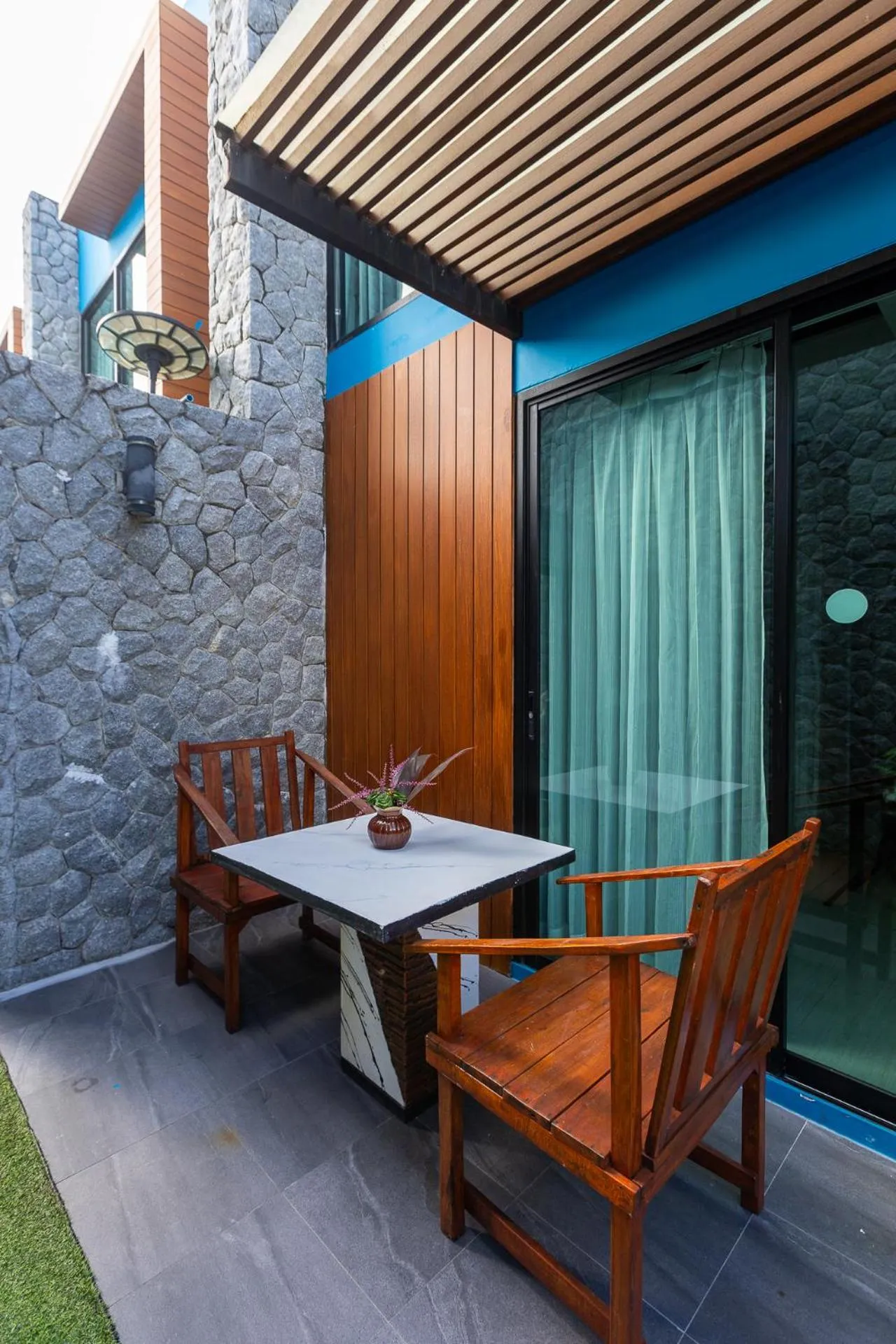 Seating area in Peace Blue Naiharn Naturist Resort Phuket SHA Extra Plus