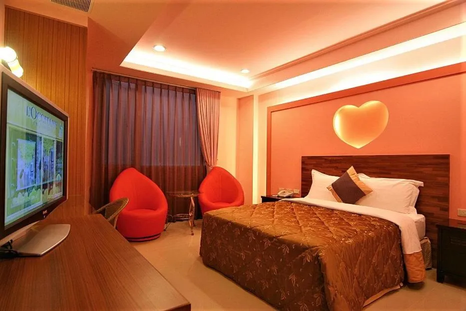 Bed in Tranquil Sea Hotel