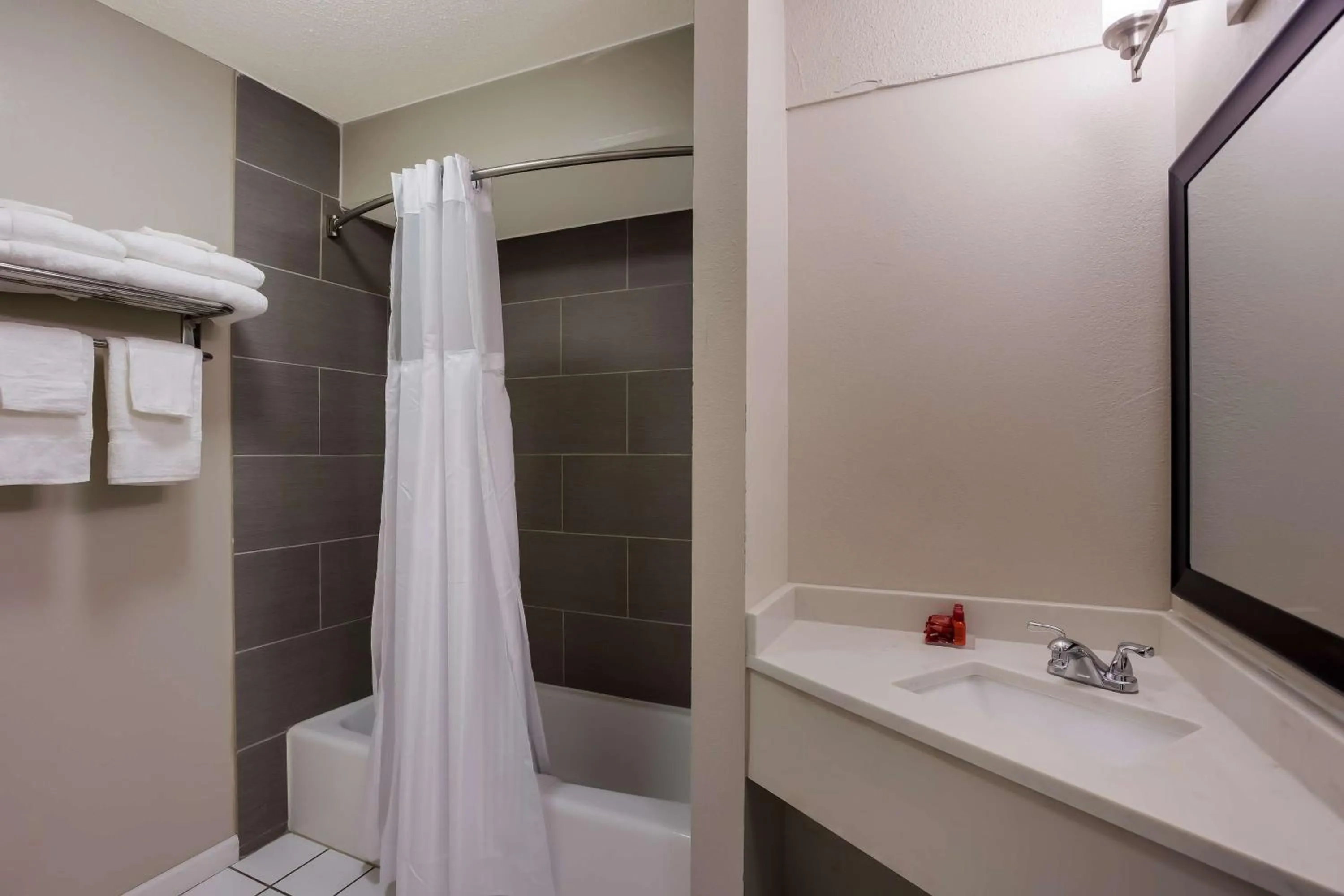 Bathroom in SureStay Hotel by Best Western Higginsville
