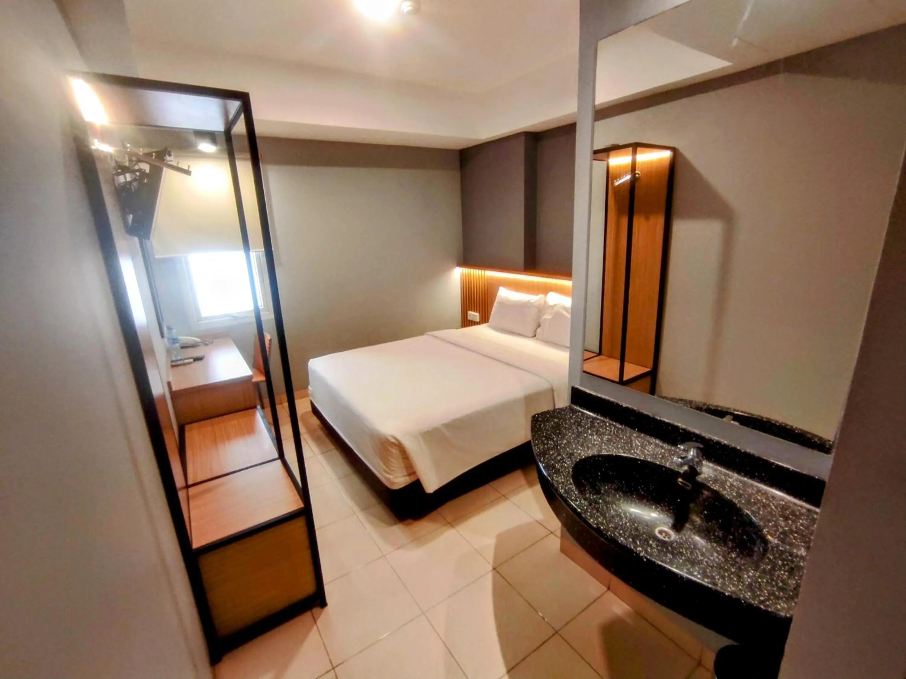 Bedroom, Bed in Studio One Thamrin Hotel