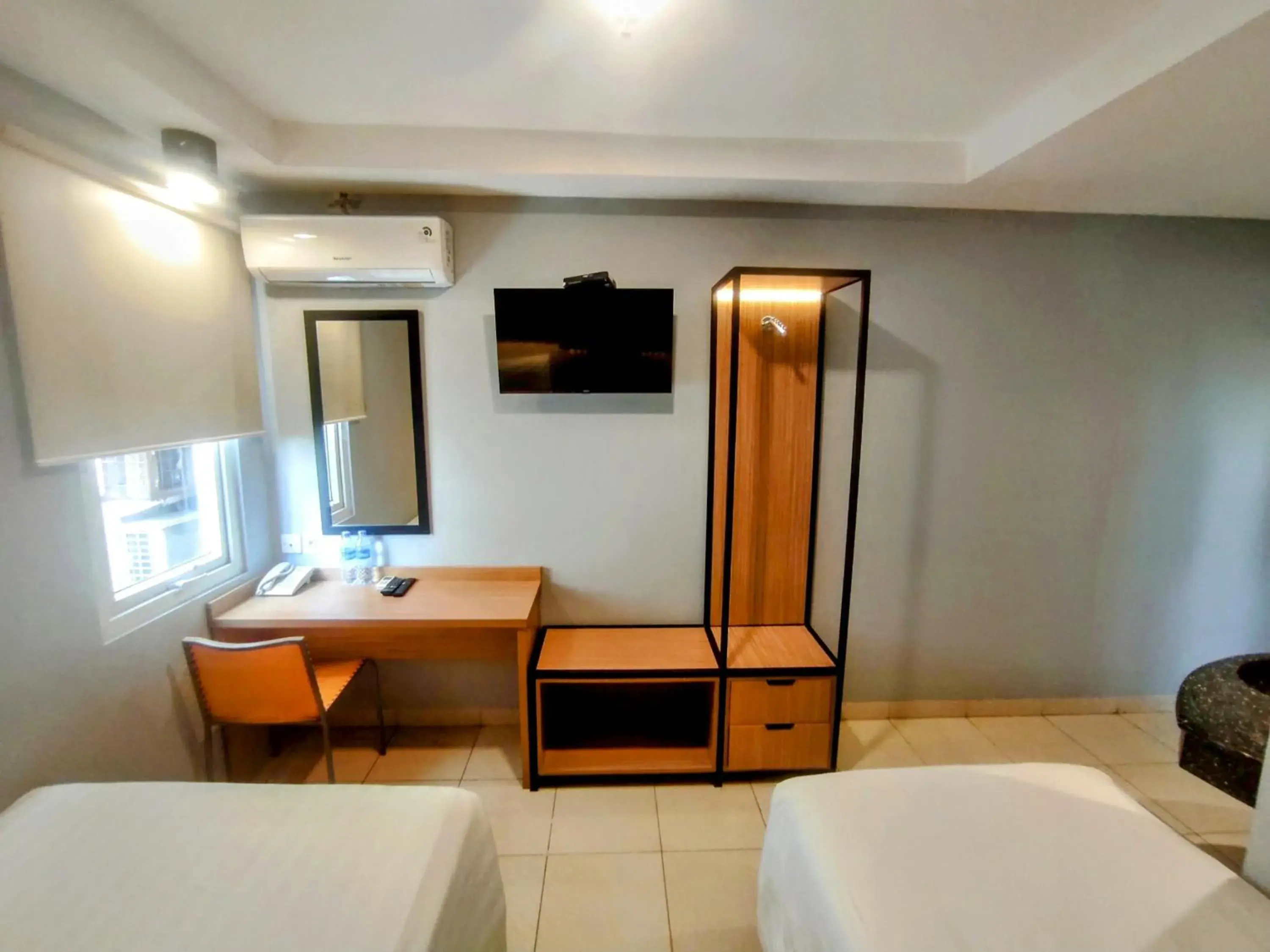 TV and multimedia, Bed in Studio One Thamrin Hotel TV and multimedia, Bed in Studio One Thamrin Hotel