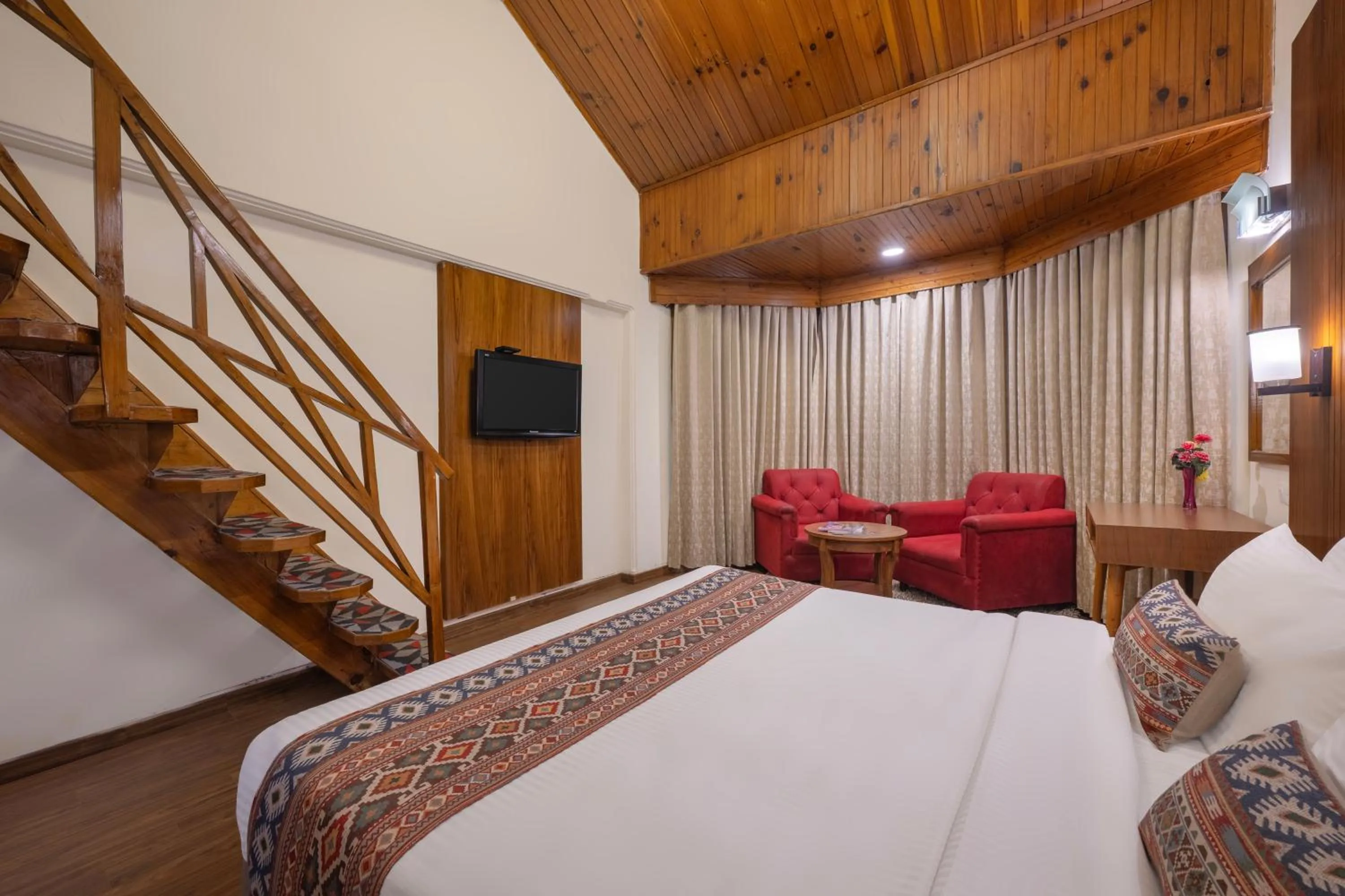Bed in Snow Valley Resorts & Spa Manali