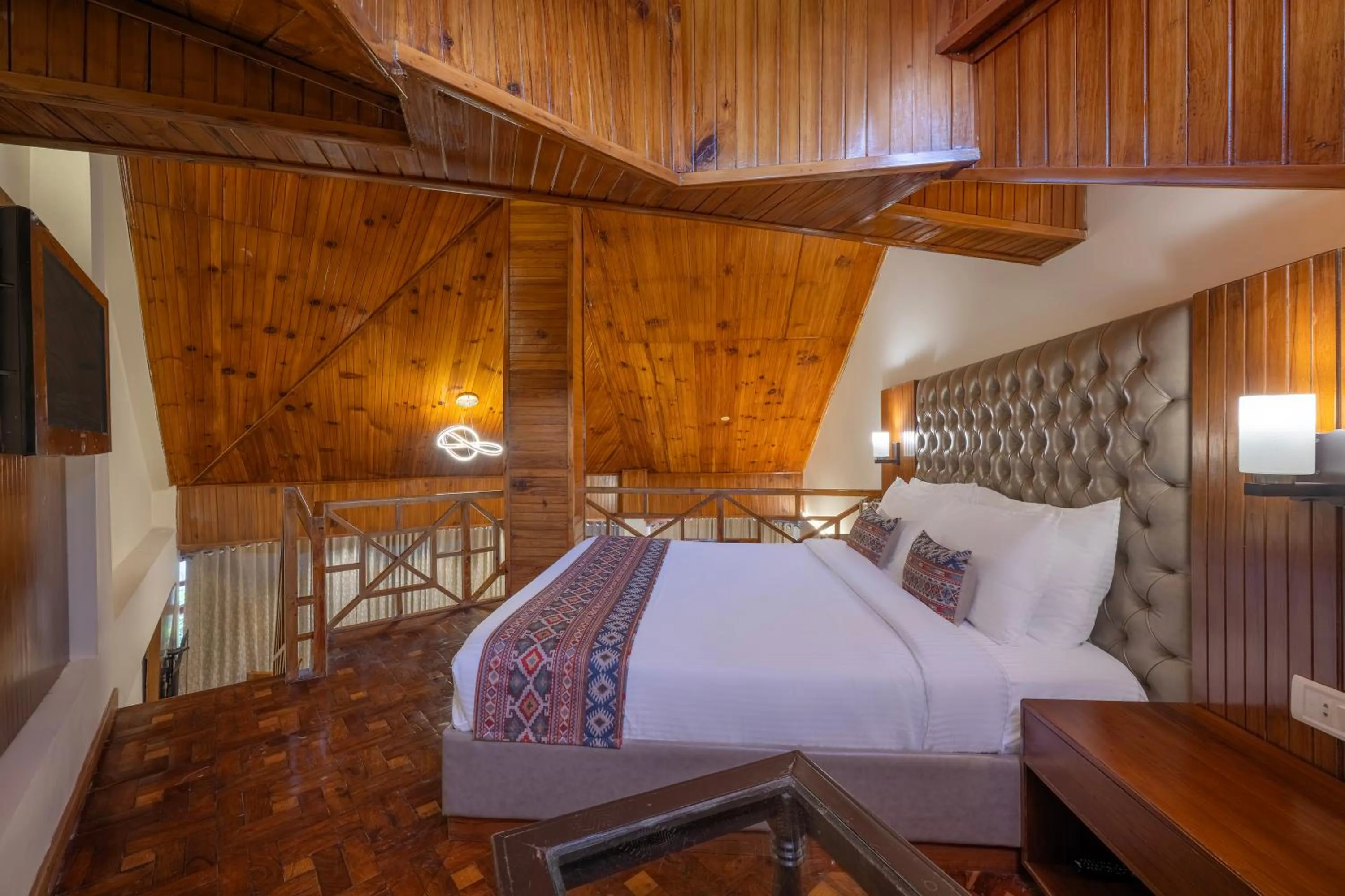 Bed in Snow Valley Resorts & Spa Manali