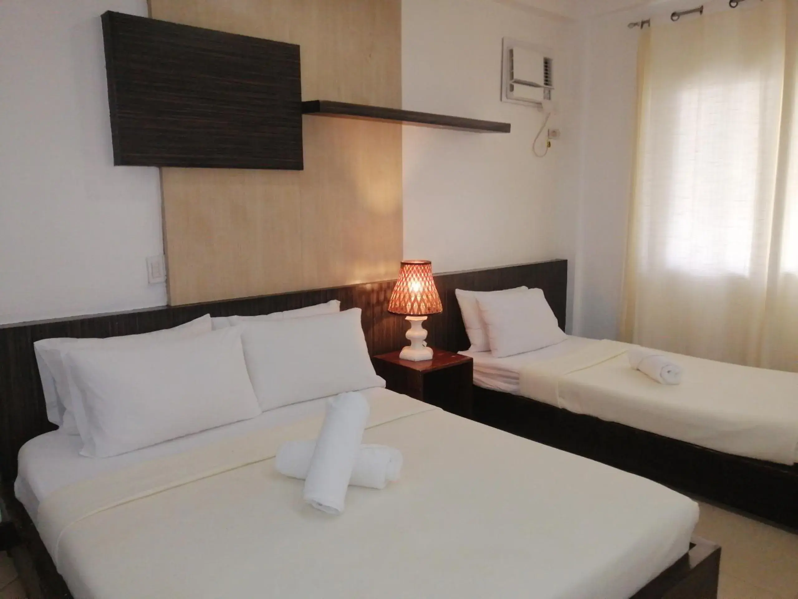 Bed in Seabird International Resort Bed in Seabird International Resort