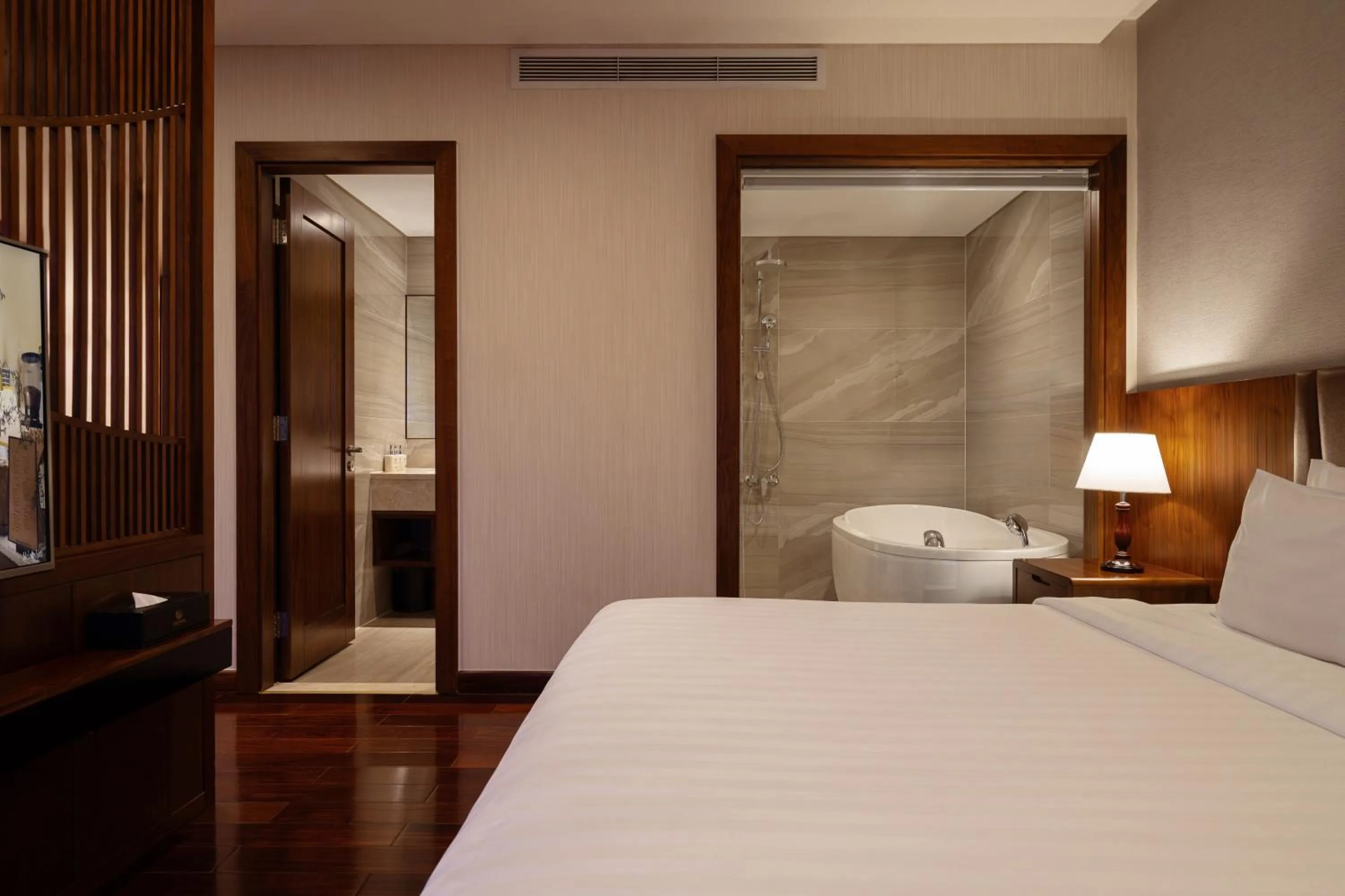 Shower, Bed in Orchids Saigon Hotel