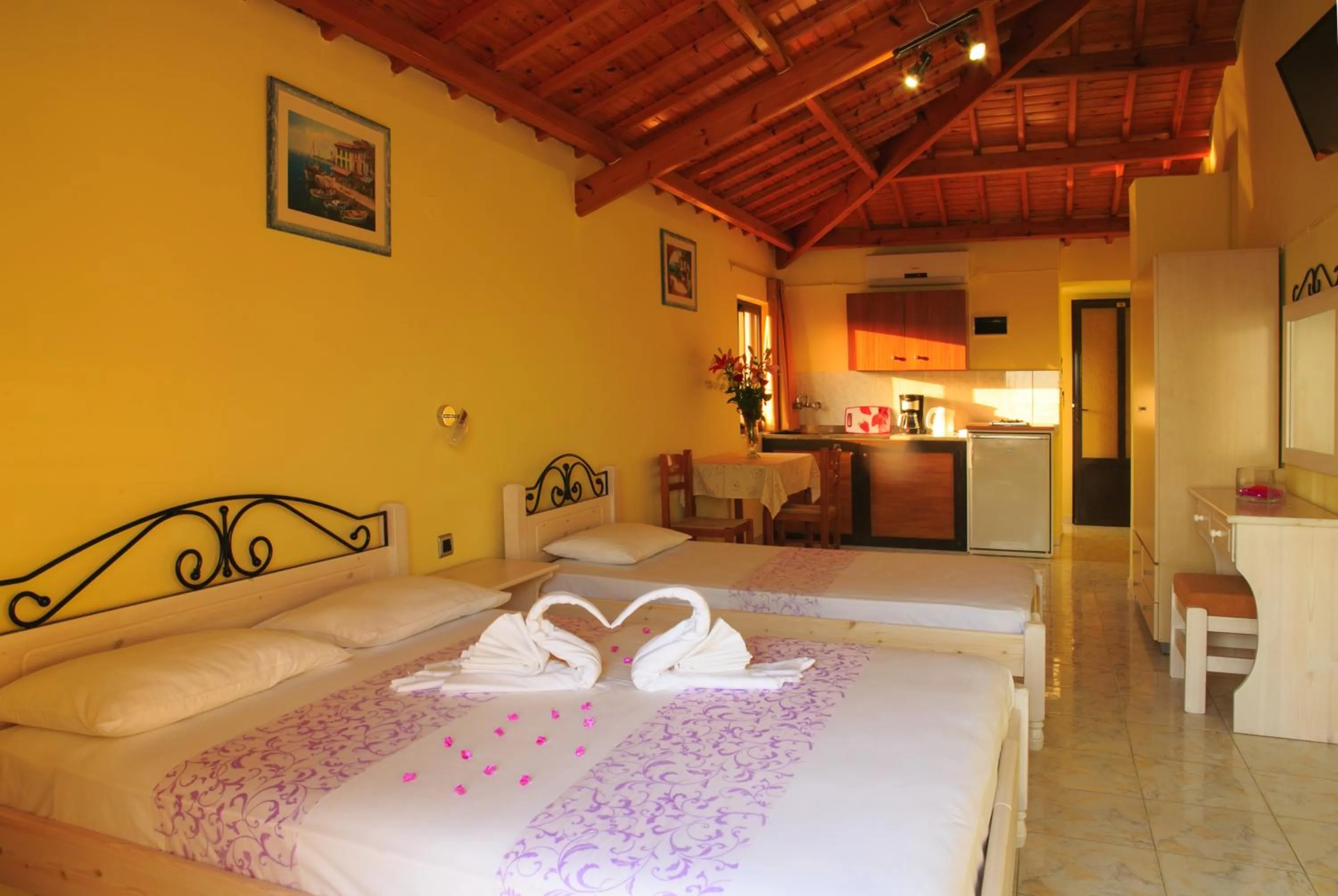 Photo of the whole room, Bed in Stroubis Studios I