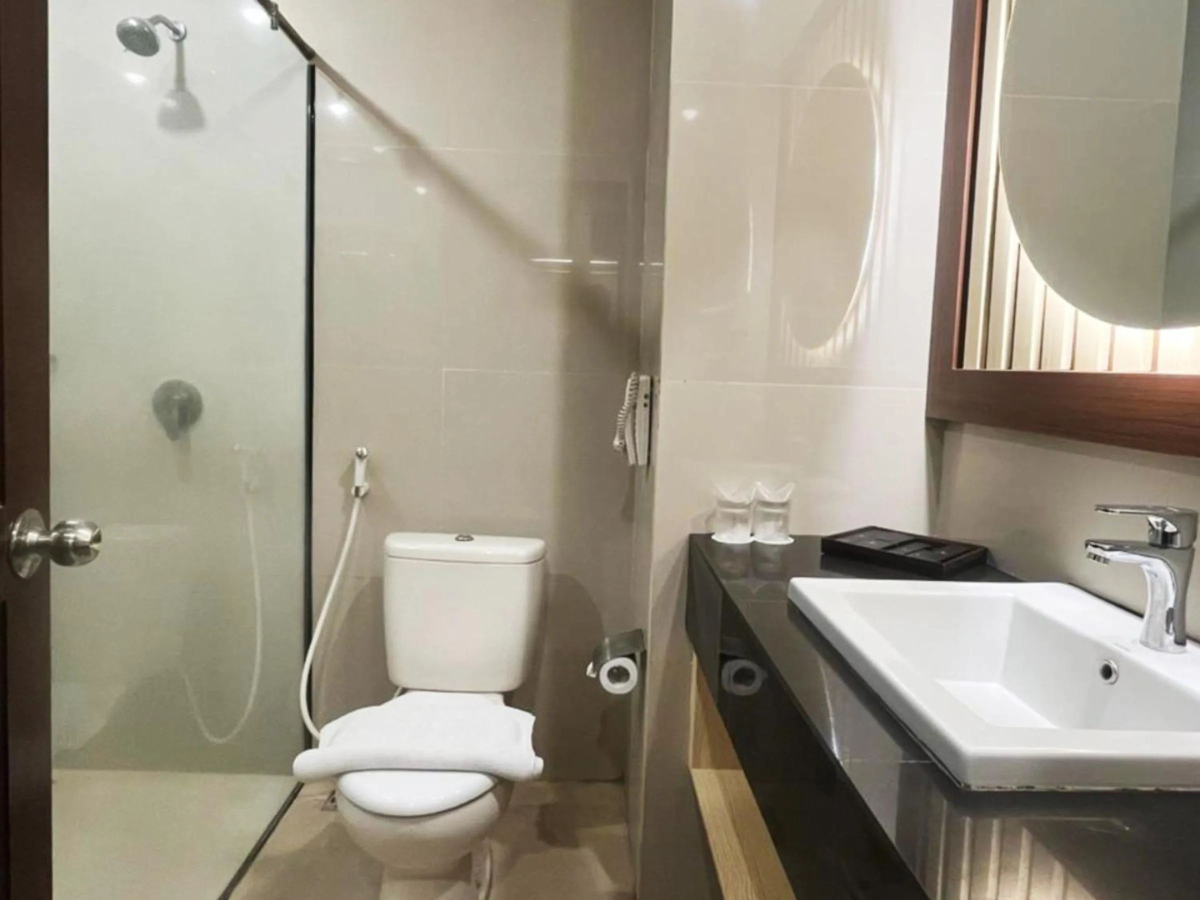 Bathroom in The Rich Jogja Hotel