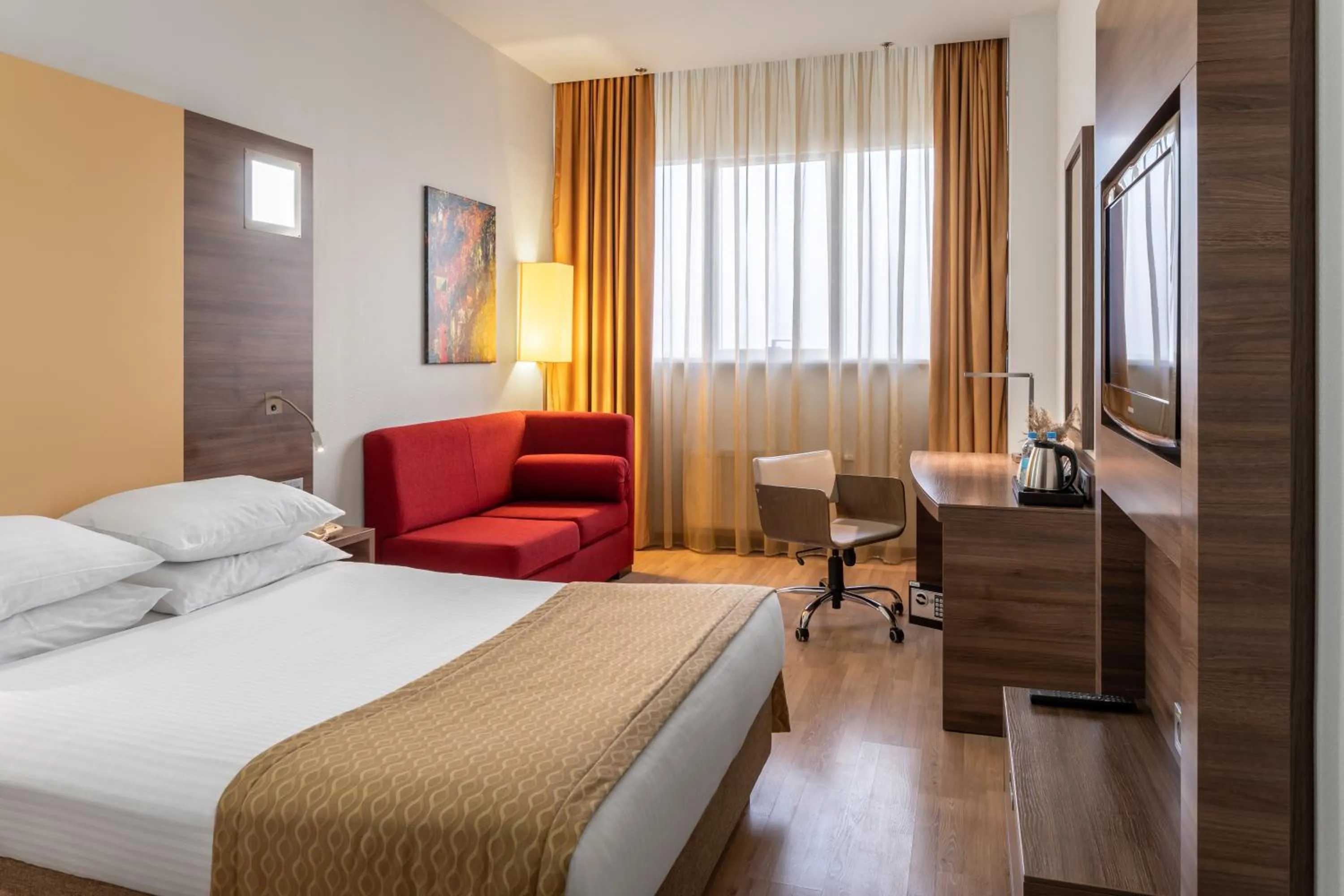 TV and multimedia, Bed in Ramada Encore Kyiv