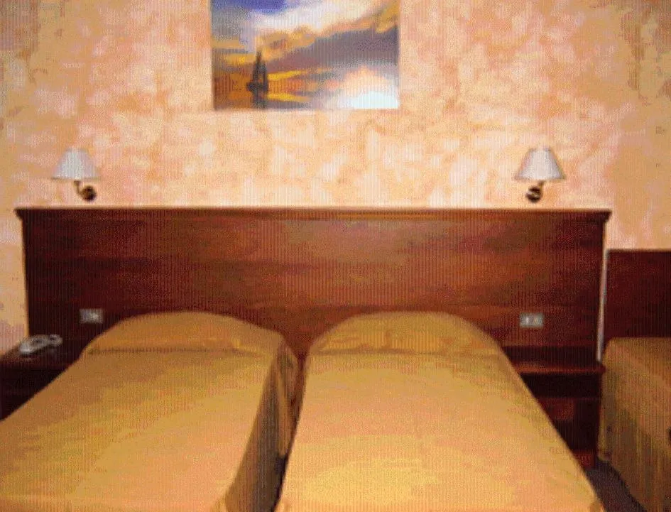 Bed in Hostiliae Ciminiera Hotel