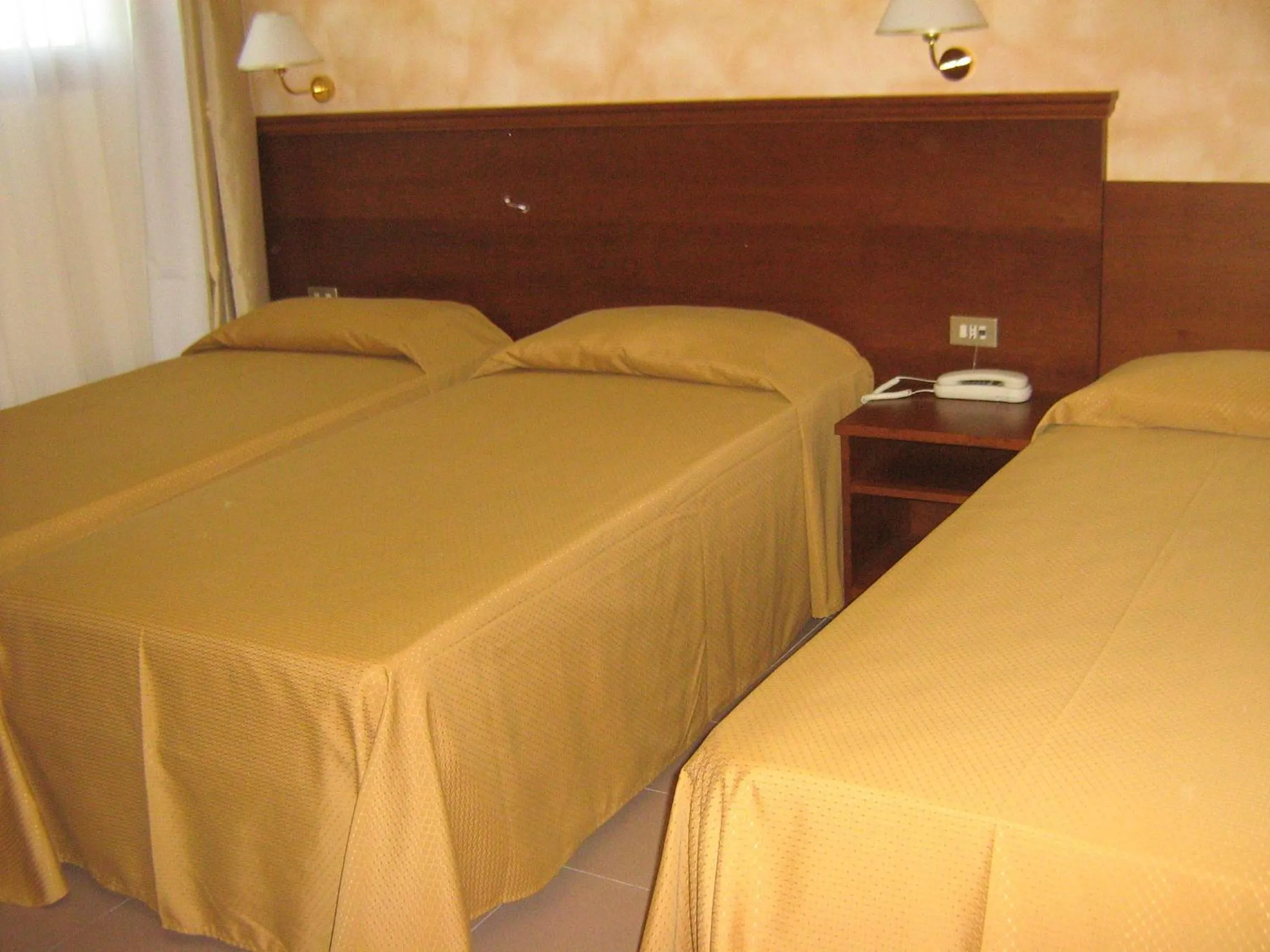 Bed in Hostiliae Ciminiera Hotel