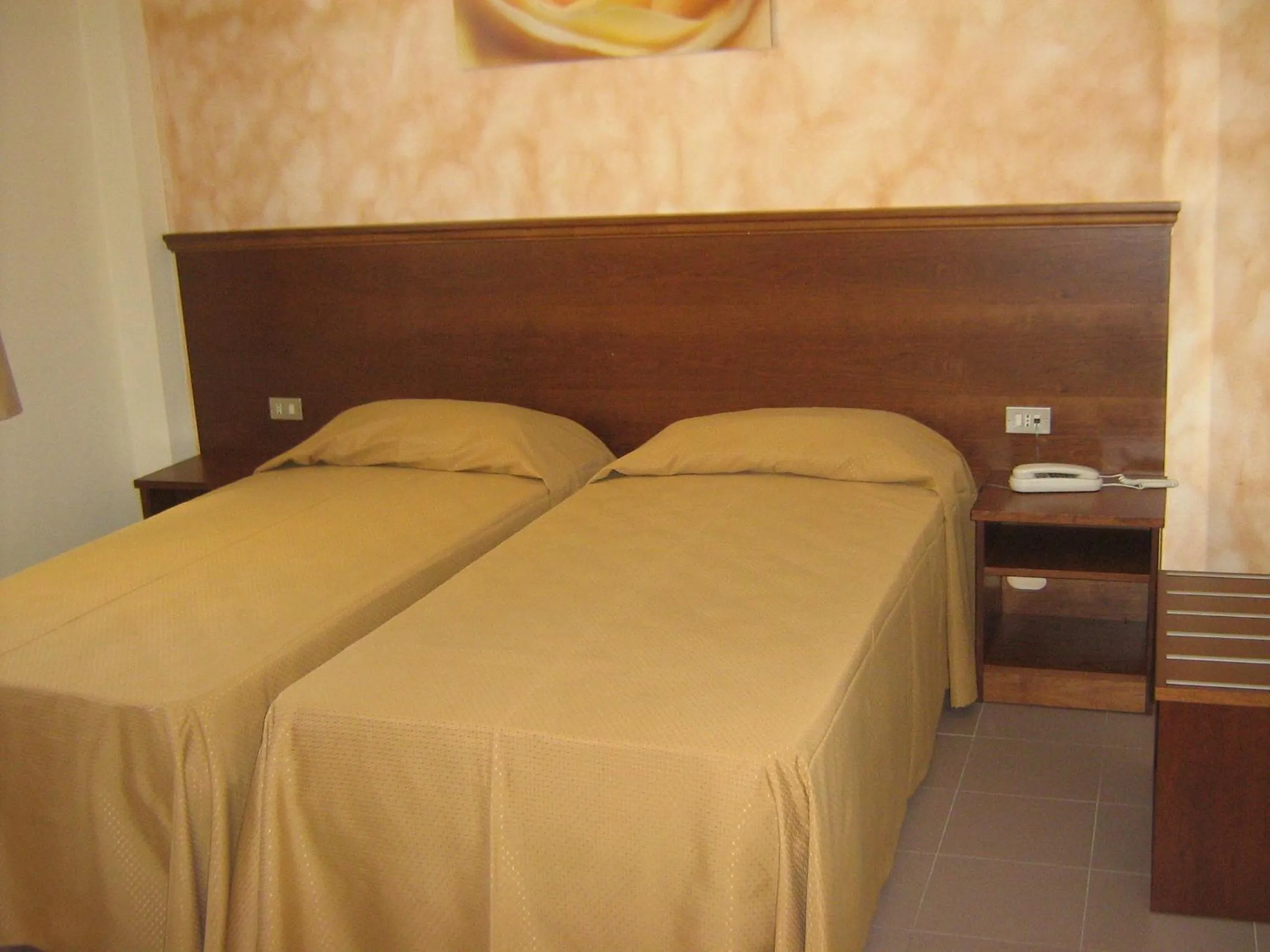 Bed in Hostiliae Ciminiera Hotel