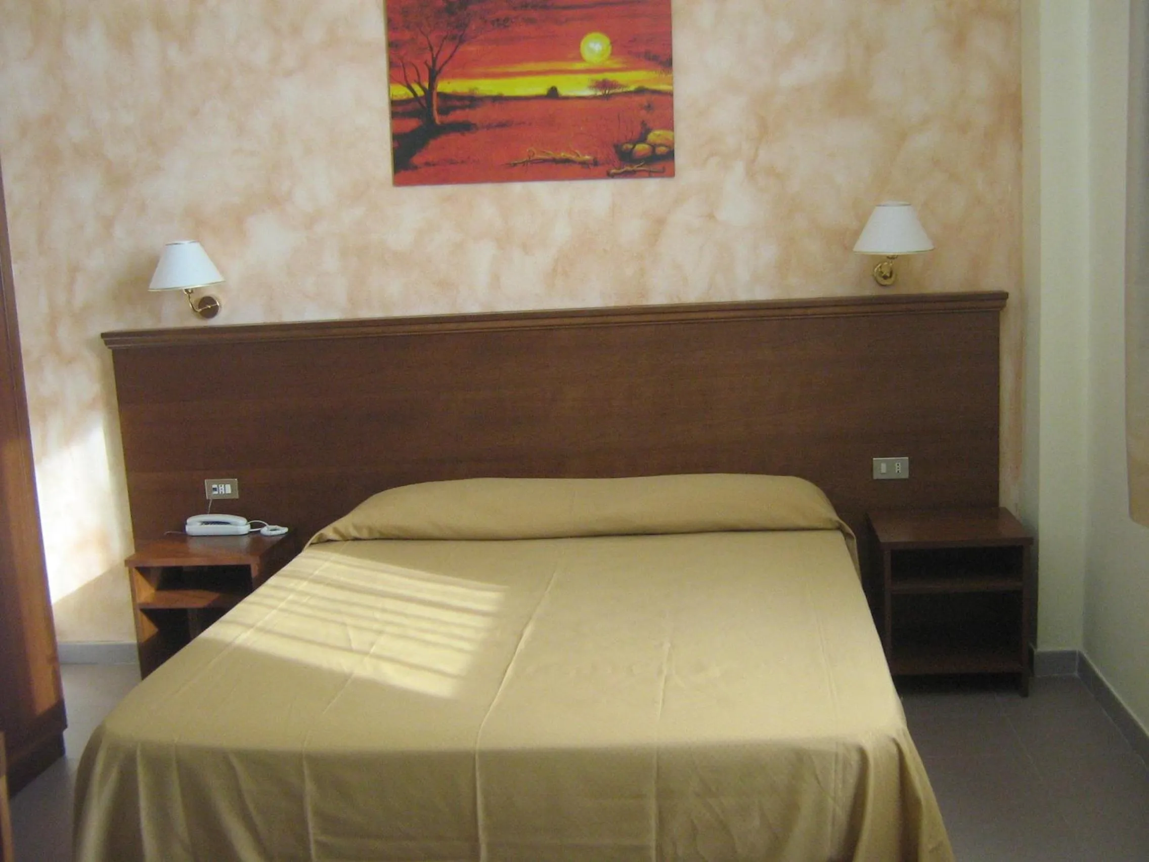 Bed in Hostiliae Ciminiera Hotel