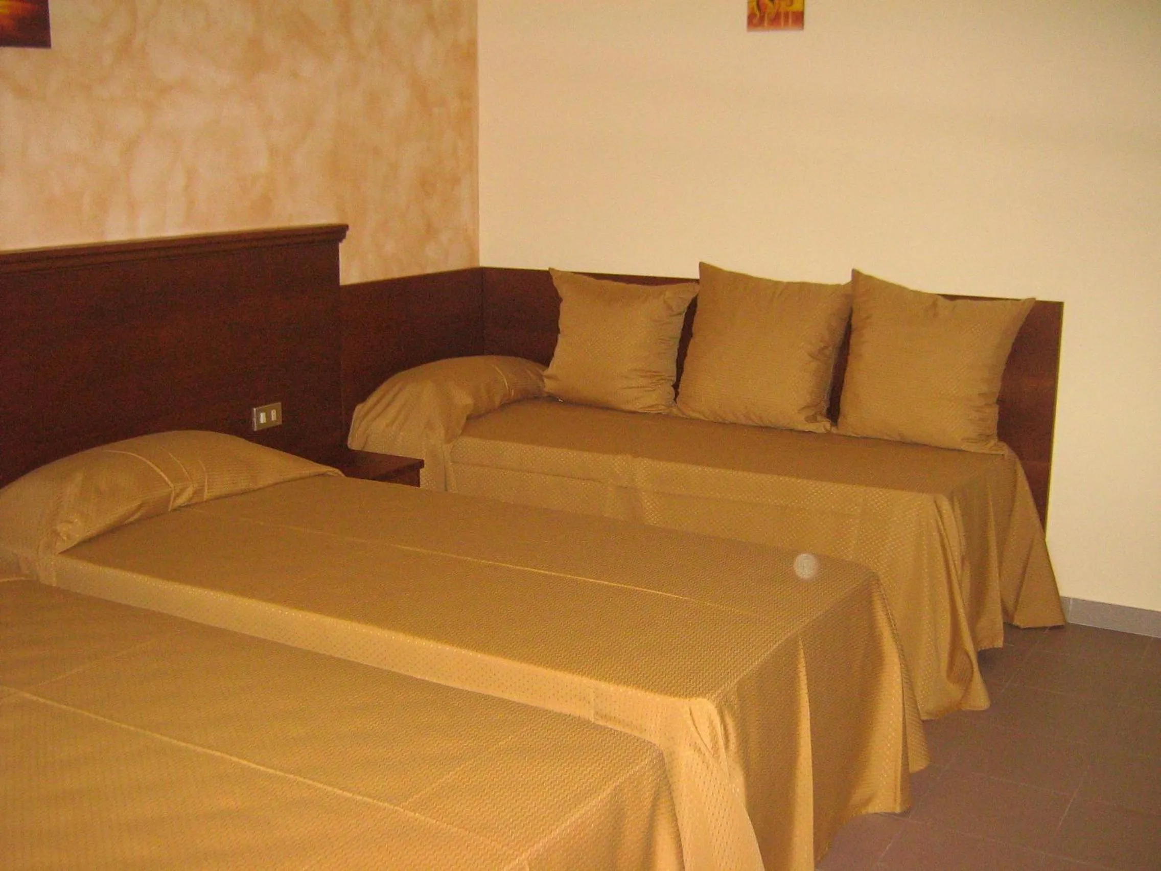 Bed in Hostiliae Ciminiera Hotel